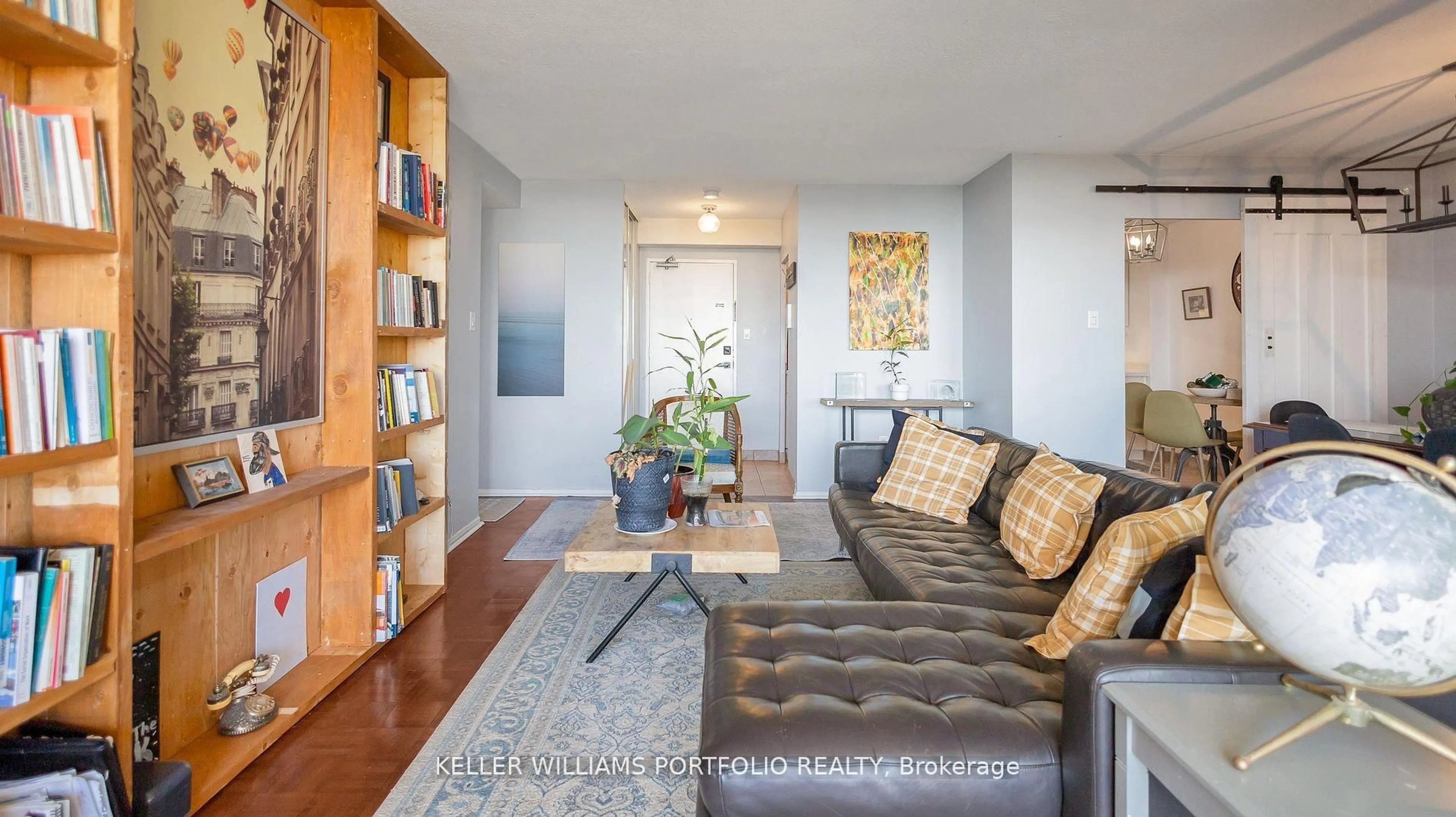 Living room with furniture, wood/laminate floor for 362 The East Mall #1006, Toronto Ontario M9B 6C4