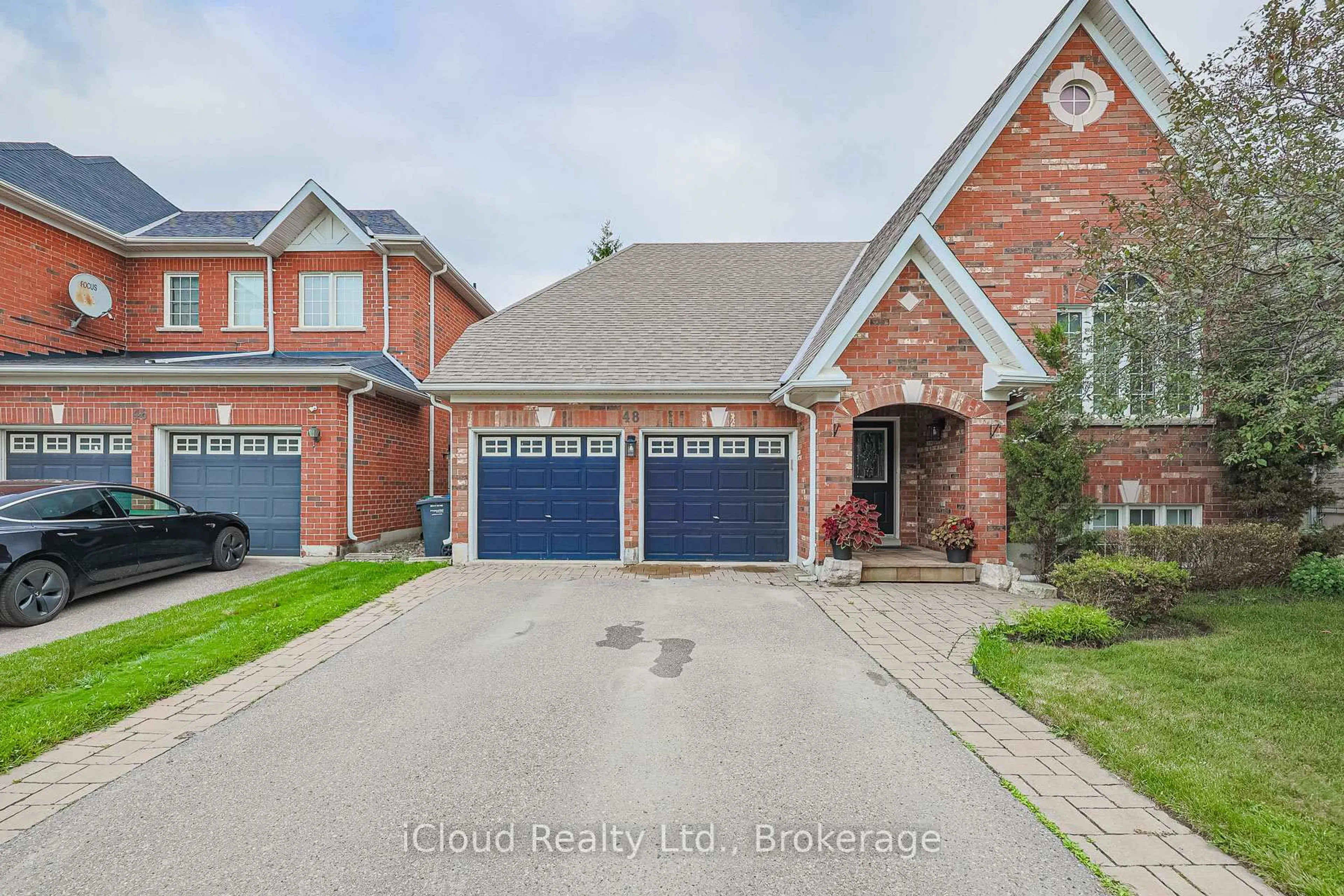 Home with brick exterior material, street for 48 Donwoods Crt, Brampton Ontario L6P 1T7