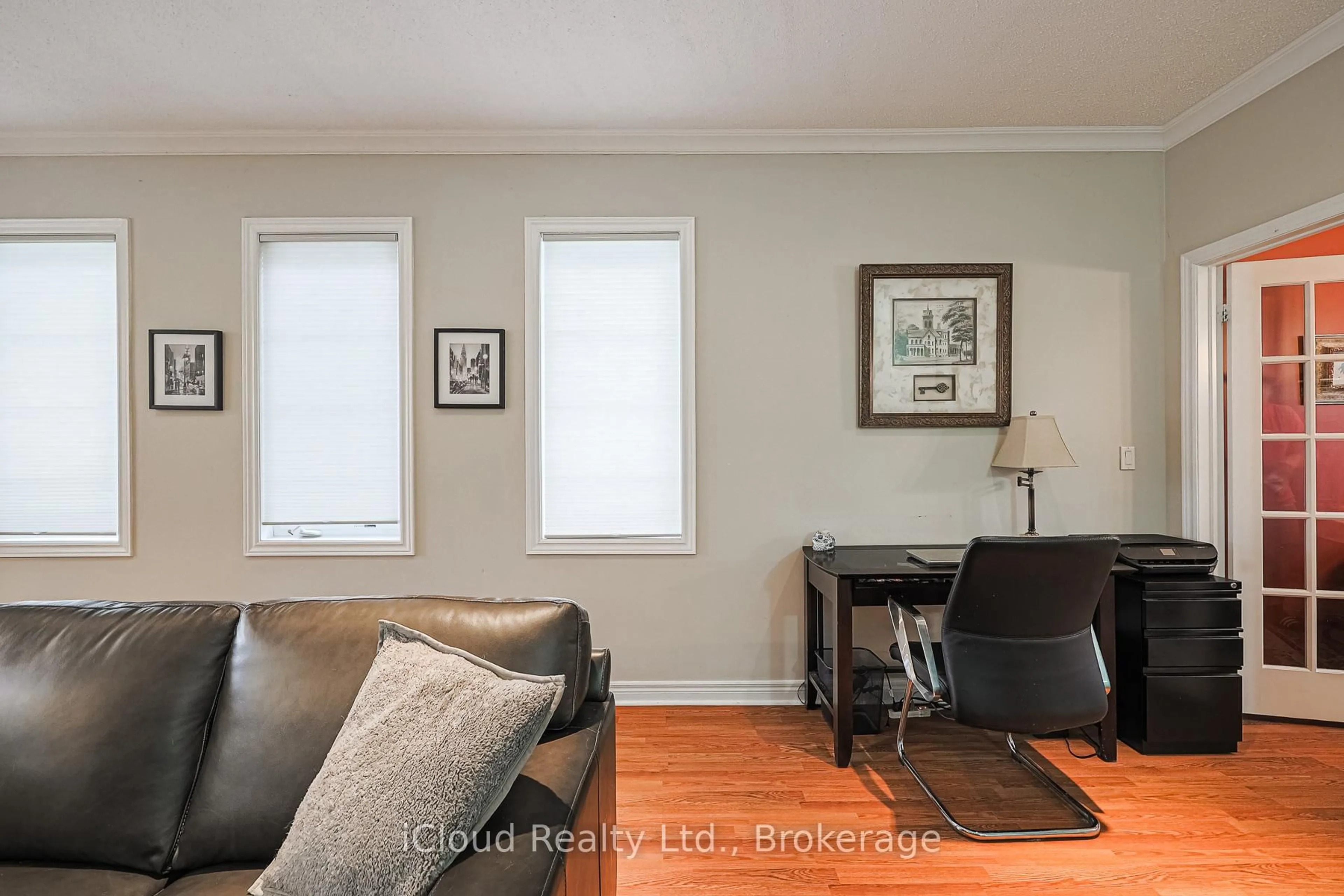 Living room with furniture, wood/laminate floor for 48 Donwoods Crt, Brampton Ontario L6P 1T7