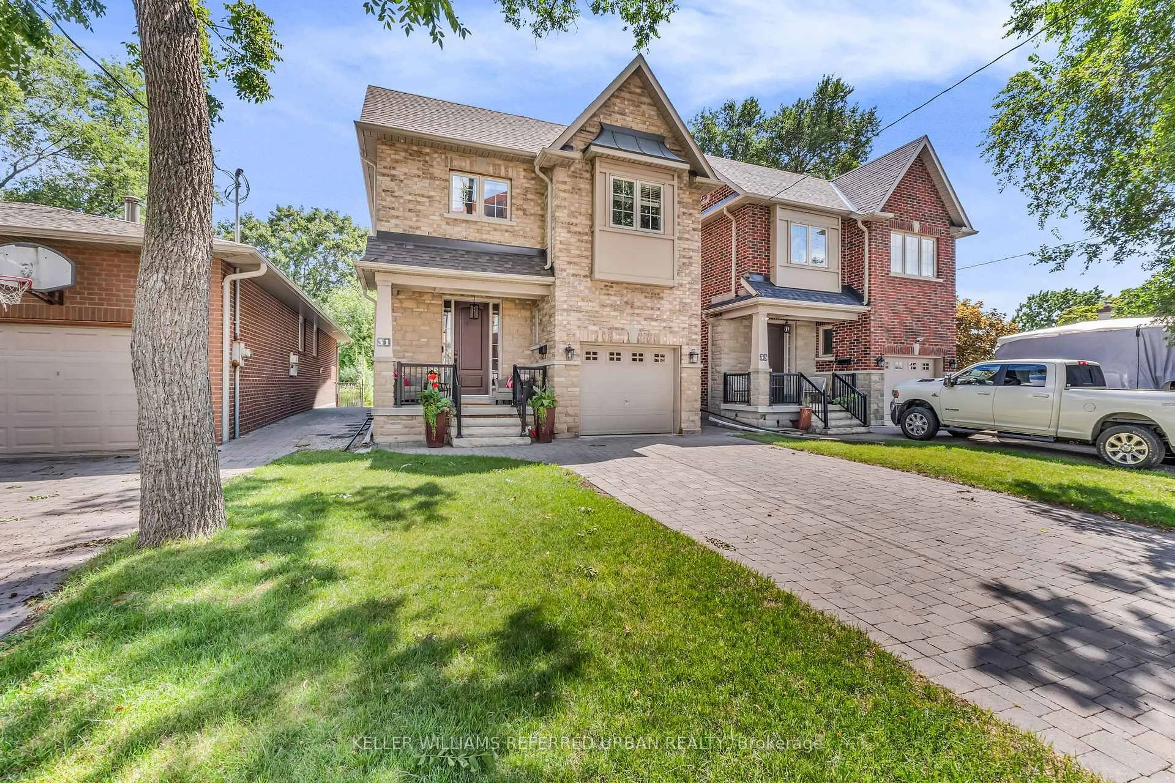 Home with brick exterior material, street for 31 Bisset Ave, Toronto Ontario M8W 2T1