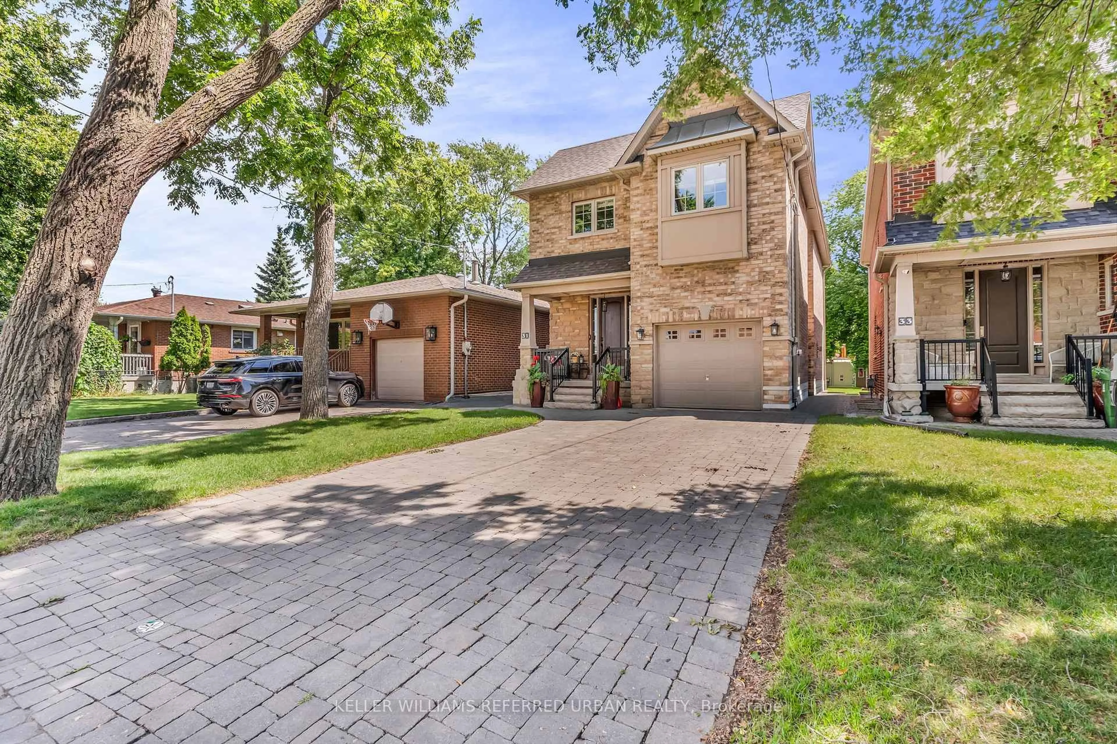 Home with brick exterior material, street for 31 Bisset Ave, Toronto Ontario M8W 2T1