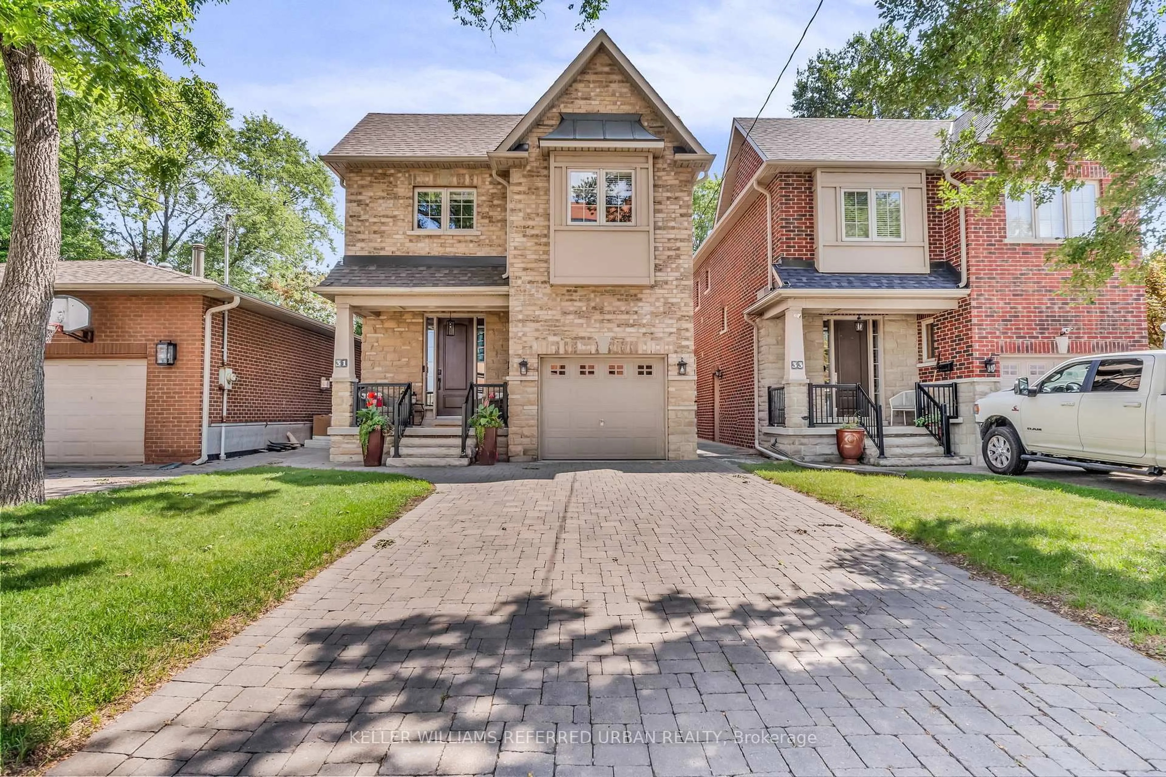 Home with brick exterior material, street for 31 Bisset Ave, Toronto Ontario M8W 2T1