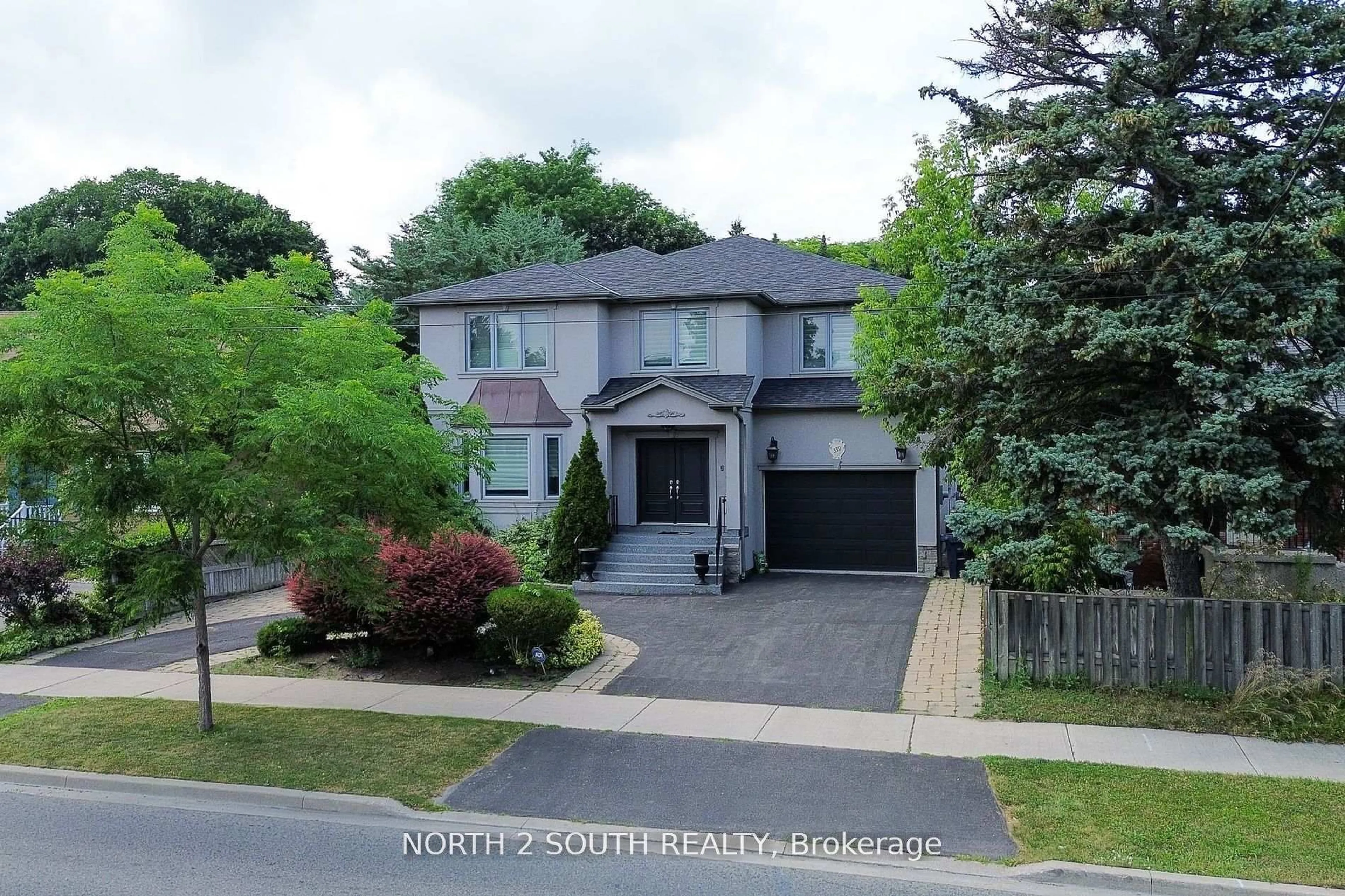 A pic from outside/outdoor area/front of a property/back of a property/a pic from drone, street for 339 Burnhamthorpe Rd, Toronto Ontario M9B 2A2