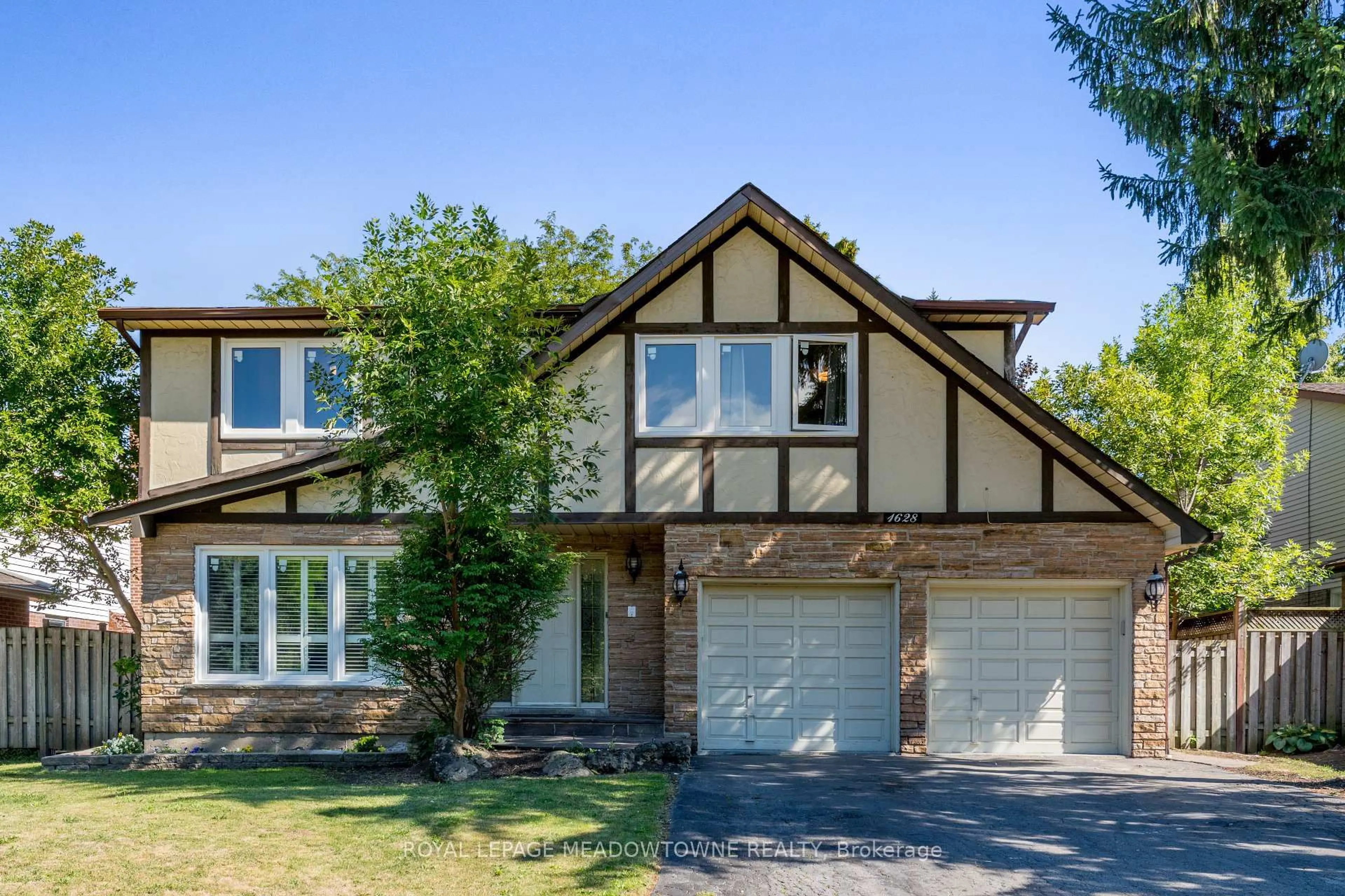 Home with brick exterior material, street for 1628 Woodeden Dr, Mississauga Ontario L5H 3S5