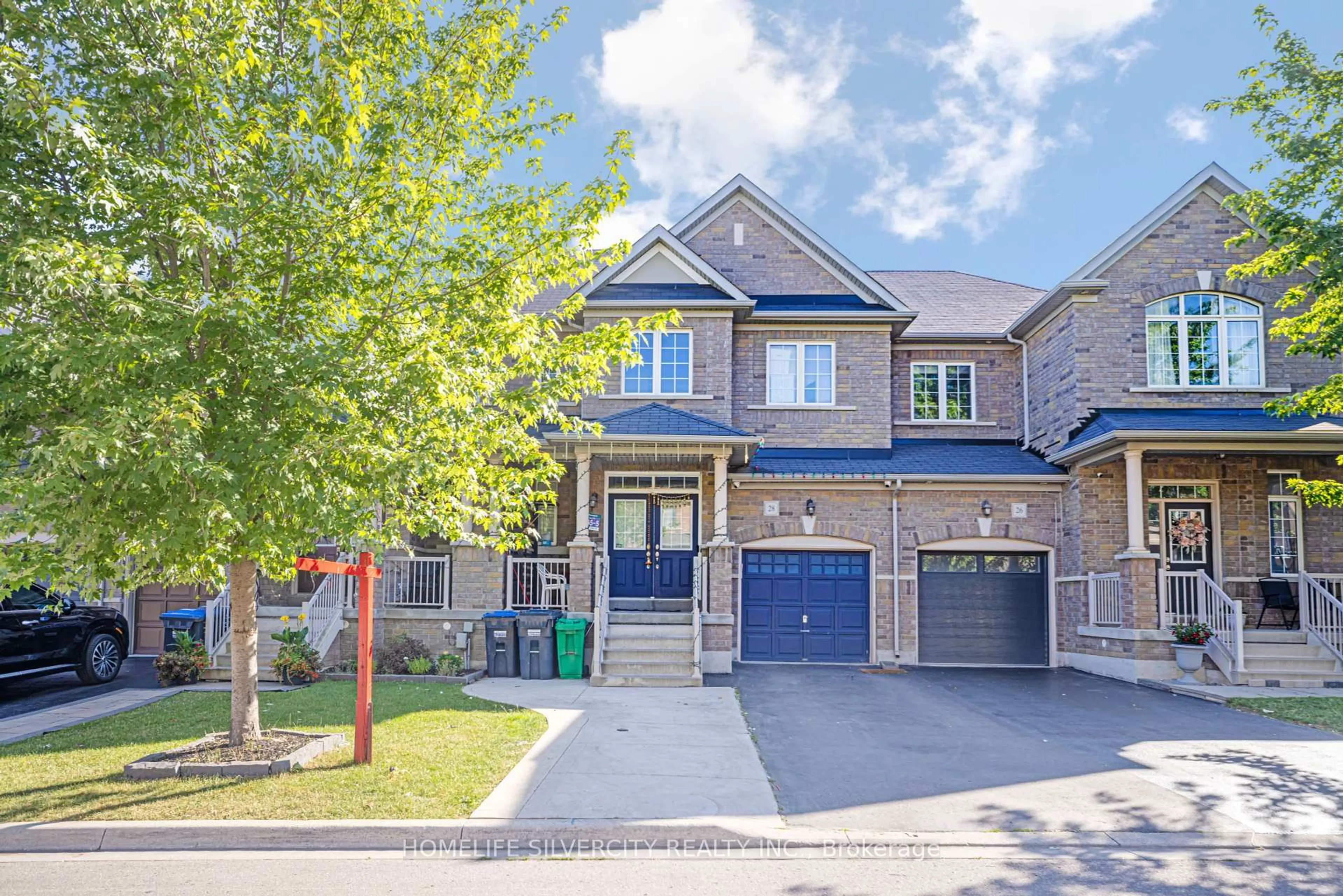 Home with brick exterior material, street for 28 Yellow Sorrel Rd, Brampton Ontario L6R 3V7