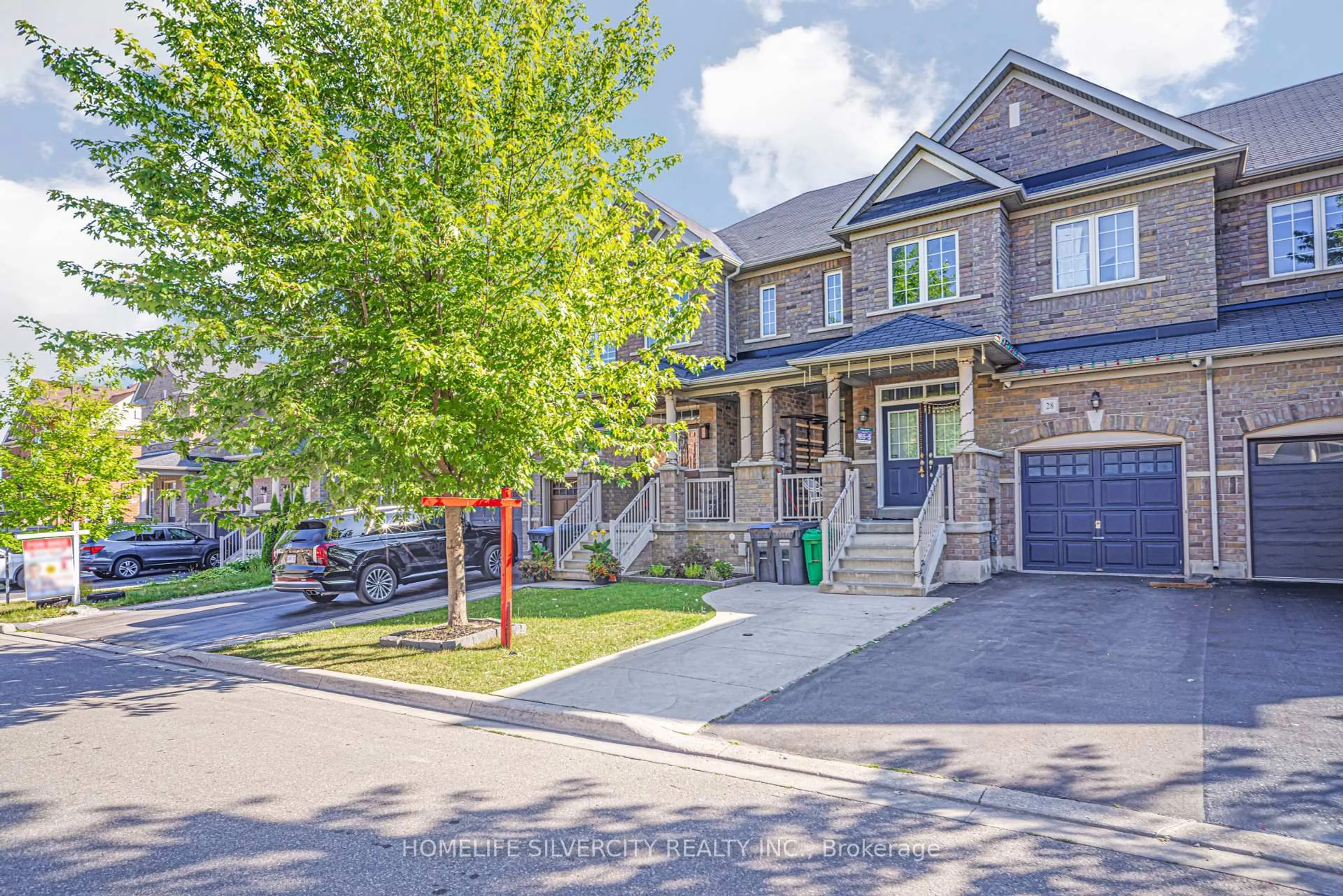 Home with brick exterior material, street for 28 Yellow Sorrel Rd, Brampton Ontario L6R 3V7
