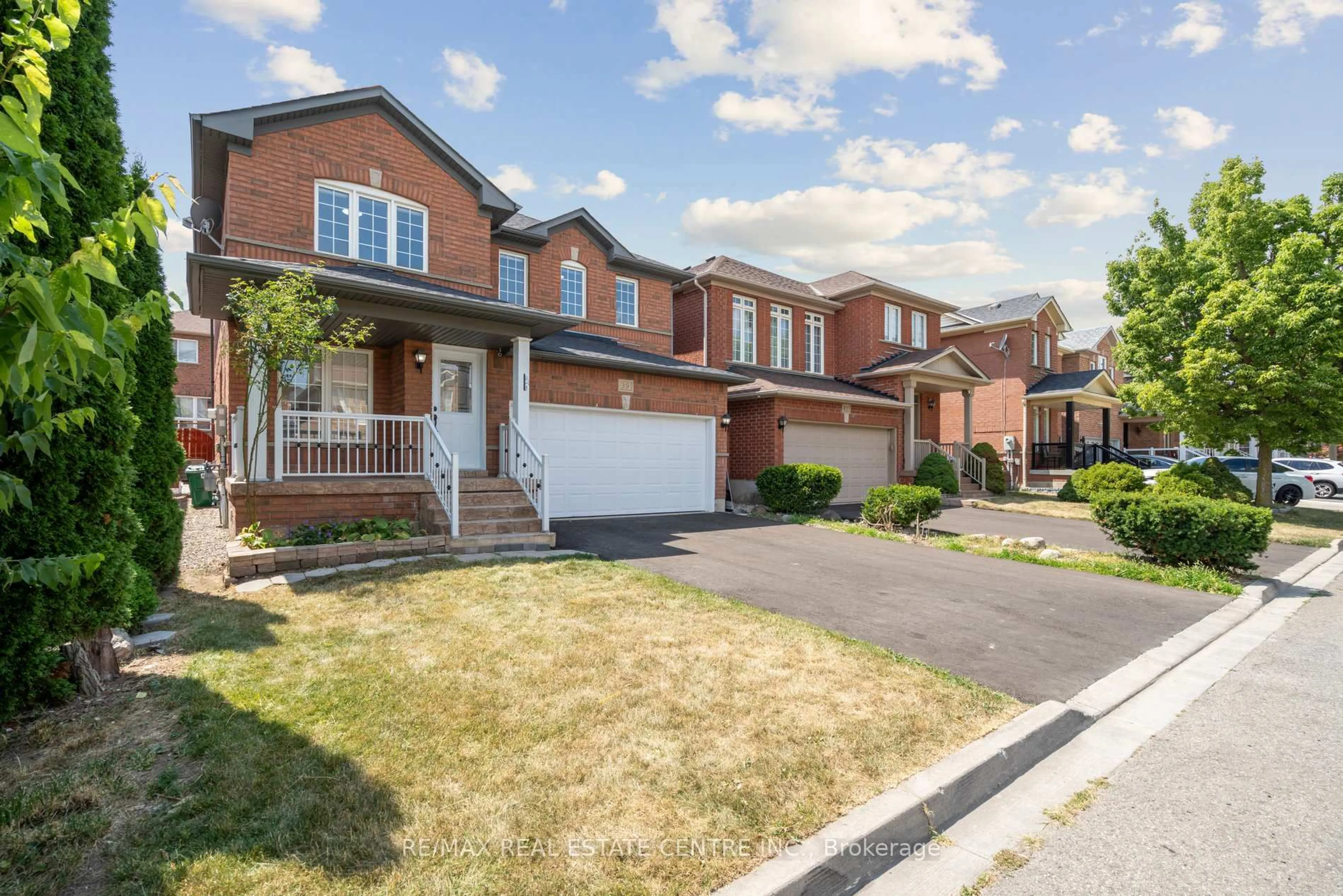 Home with brick exterior material, street for 39 Four Seasons Circ, Brampton Ontario L7A 2A7