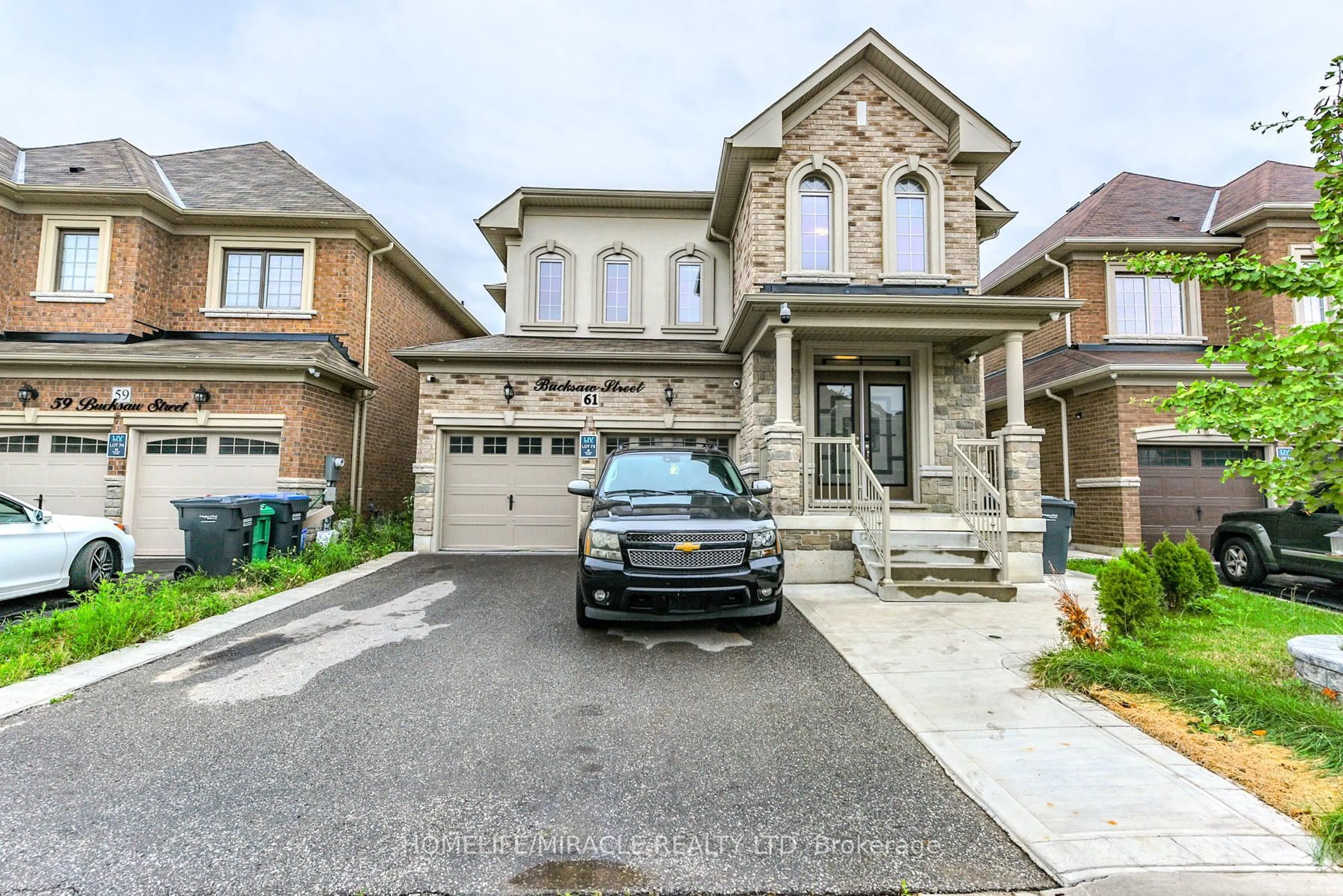 Home with brick exterior material, street for 61 Bucksaw St, Brampton Ontario L7A 4P8