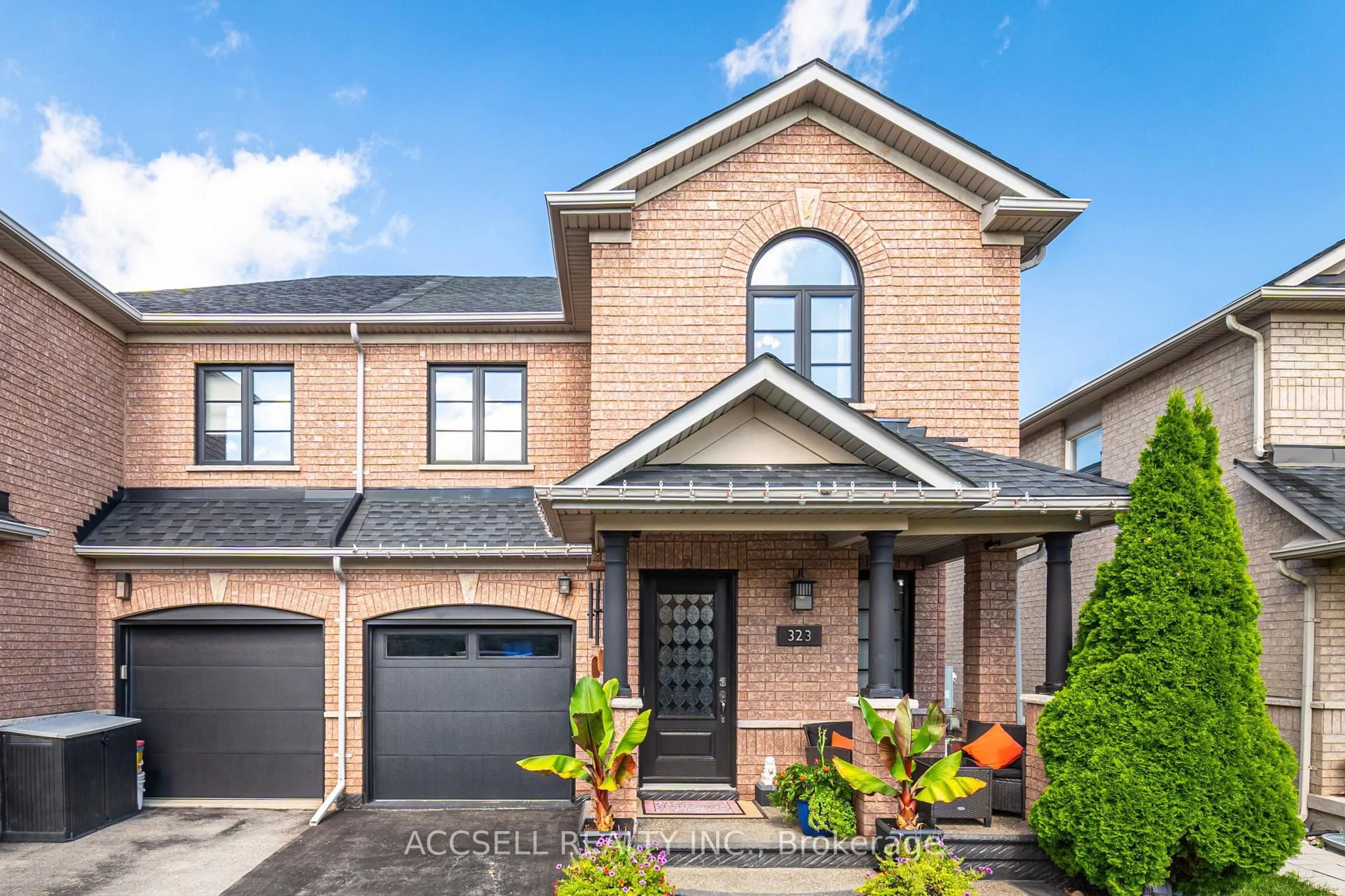 Home with brick exterior material, street for 323 Pettigrew Tr, Milton Ontario L9T 5X8