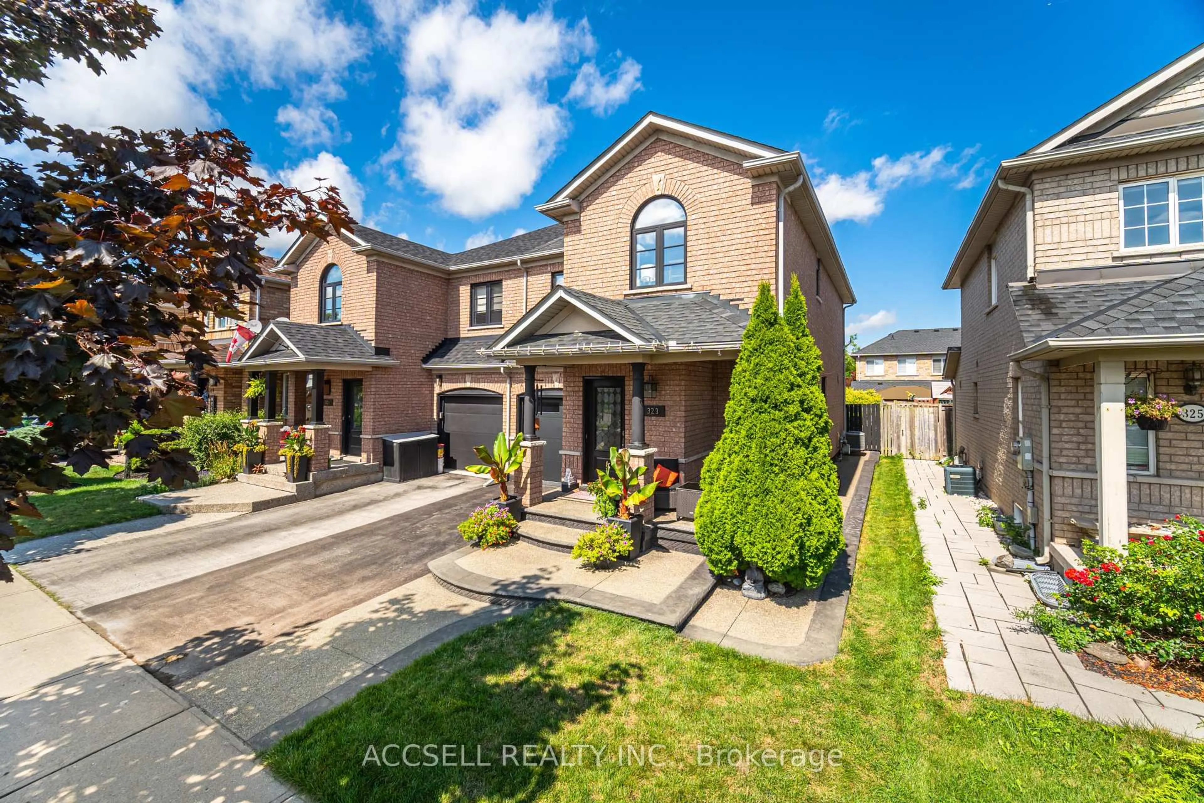 Home with brick exterior material, street for 323 Pettigrew Tr, Milton Ontario L9T 5X8