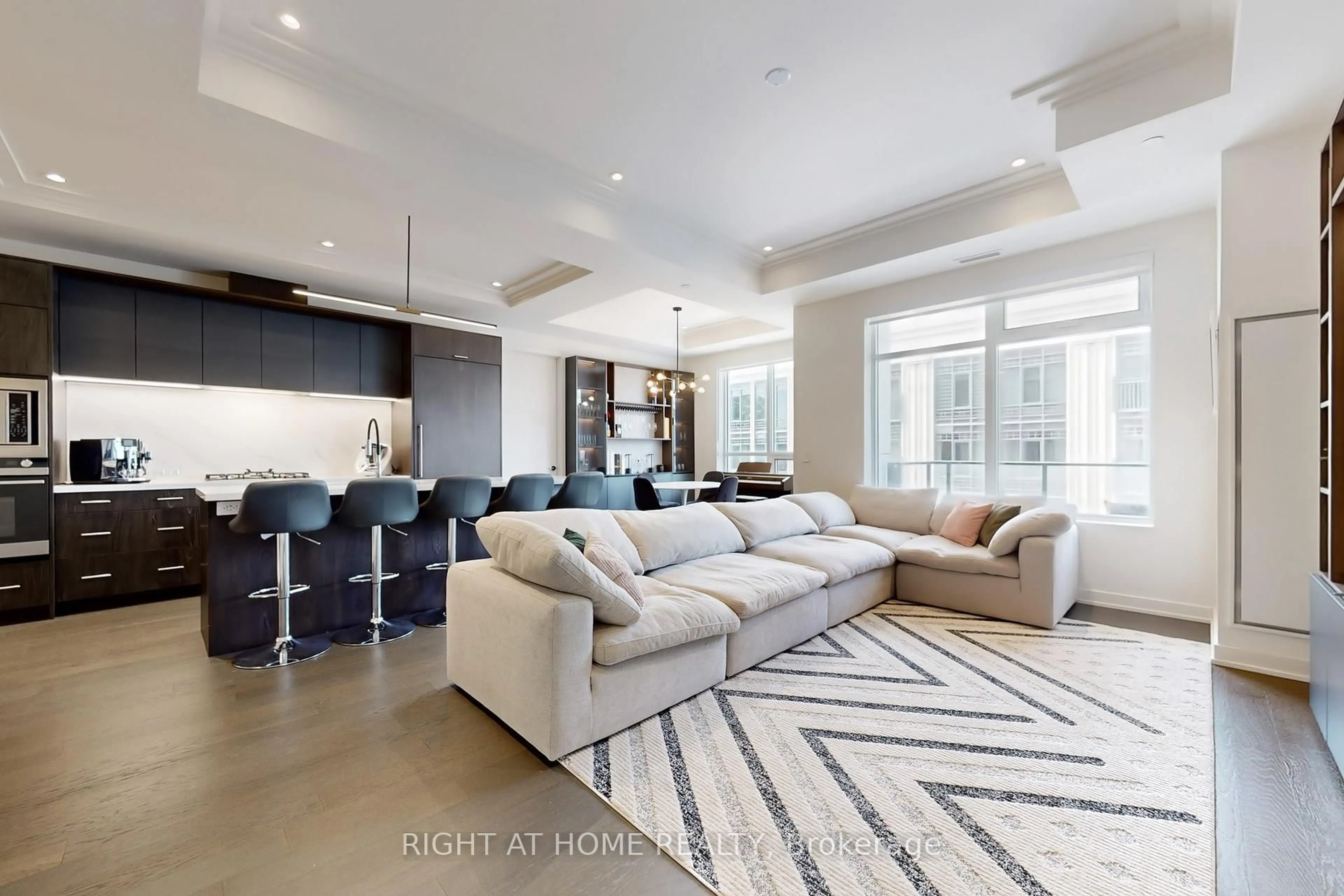 Living room with furniture, unknown for 123 Maurice Dr #317, Oakville Ontario L6K 2W6