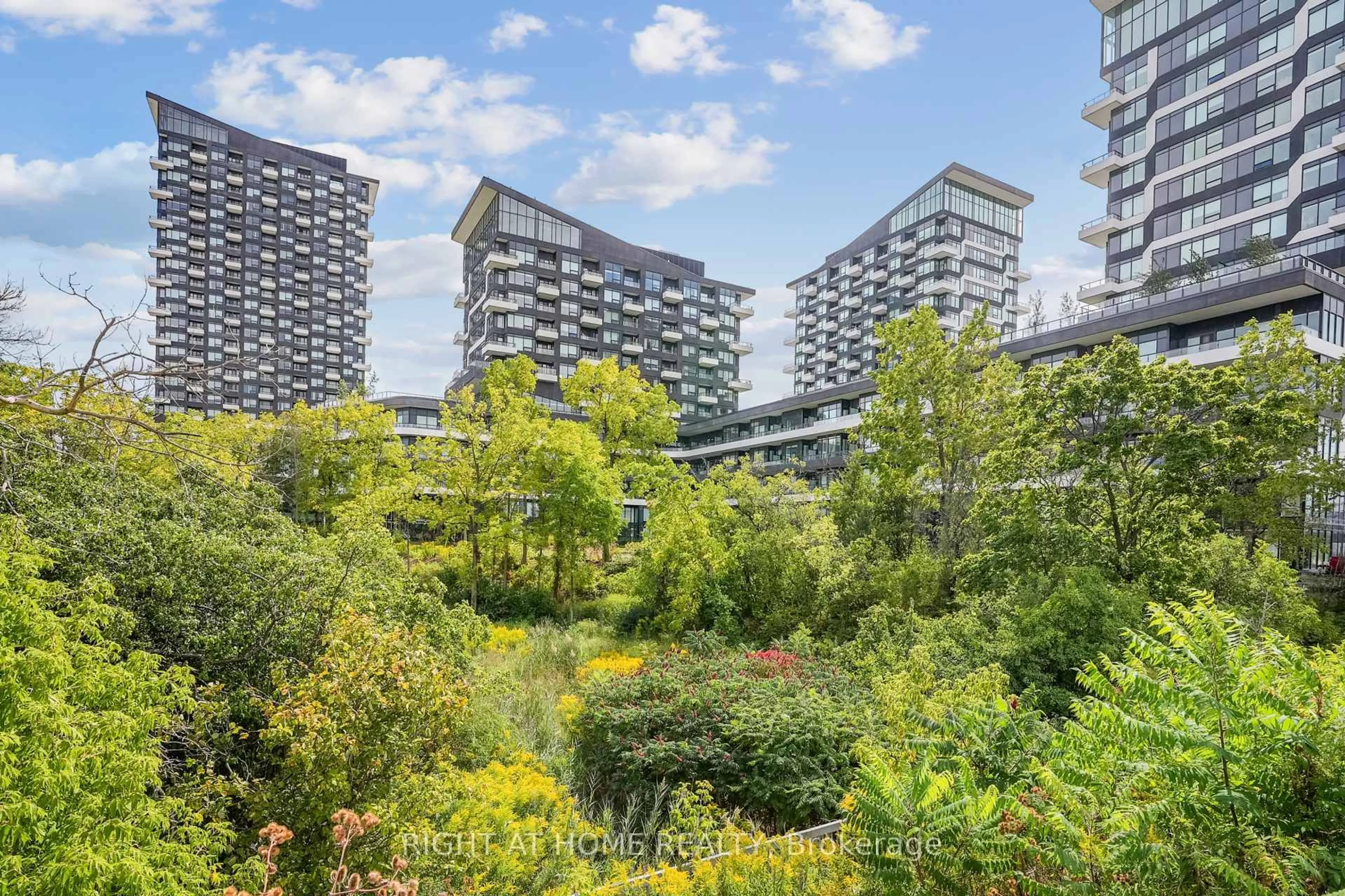 Patio, city buildings view from balcony for 2485 Taunton Rd #436, Oakville Ontario L6H 3R8