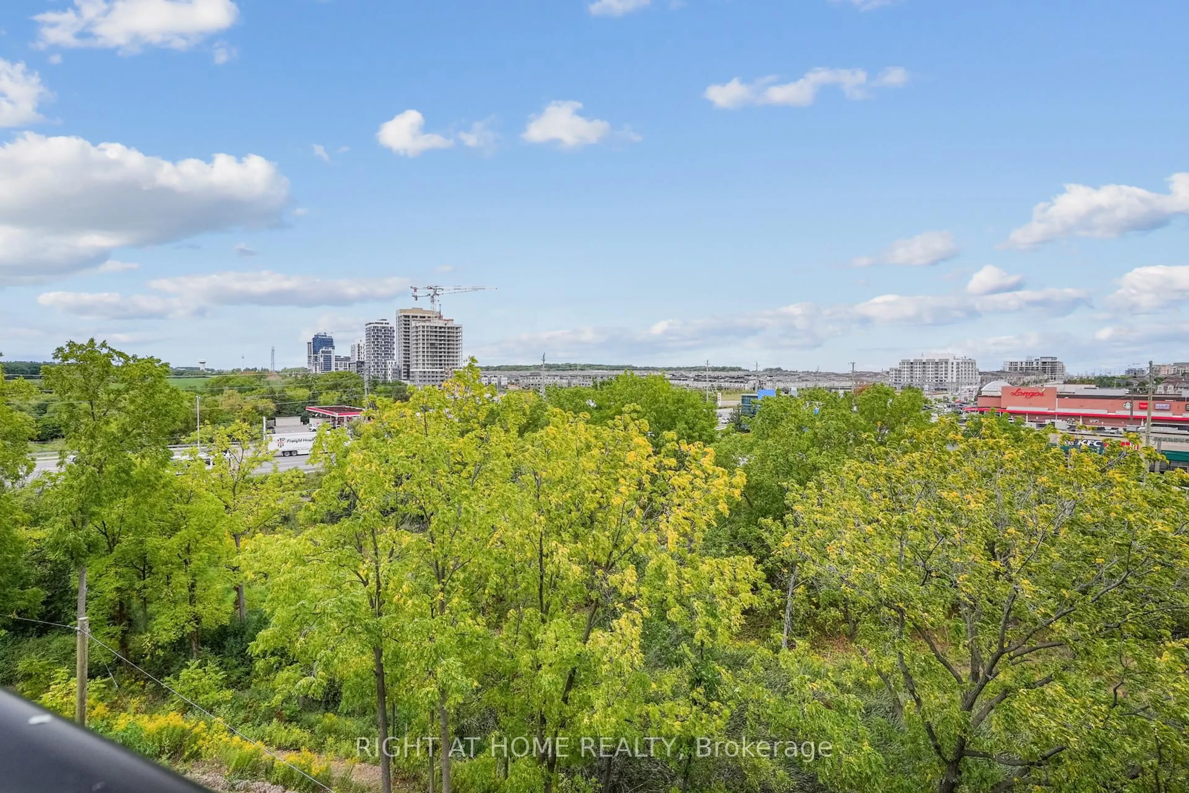 A pic from outside/outdoor area/front of a property/back of a property/a pic from drone, city buildings view from balcony for 2485 Taunton Rd #436, Oakville Ontario L6H 3R8