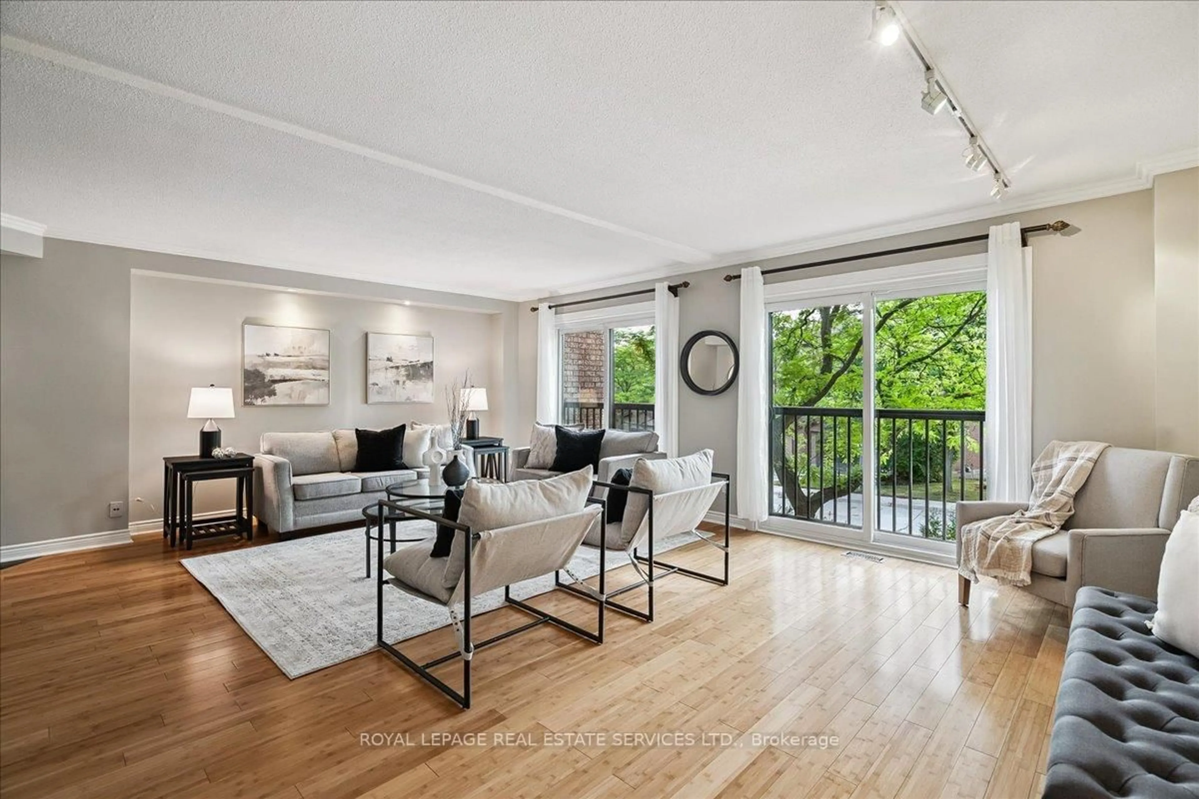Living room with furniture, unknown for 1100 Queens Ave #5, Oakville Ontario L6H 2B5