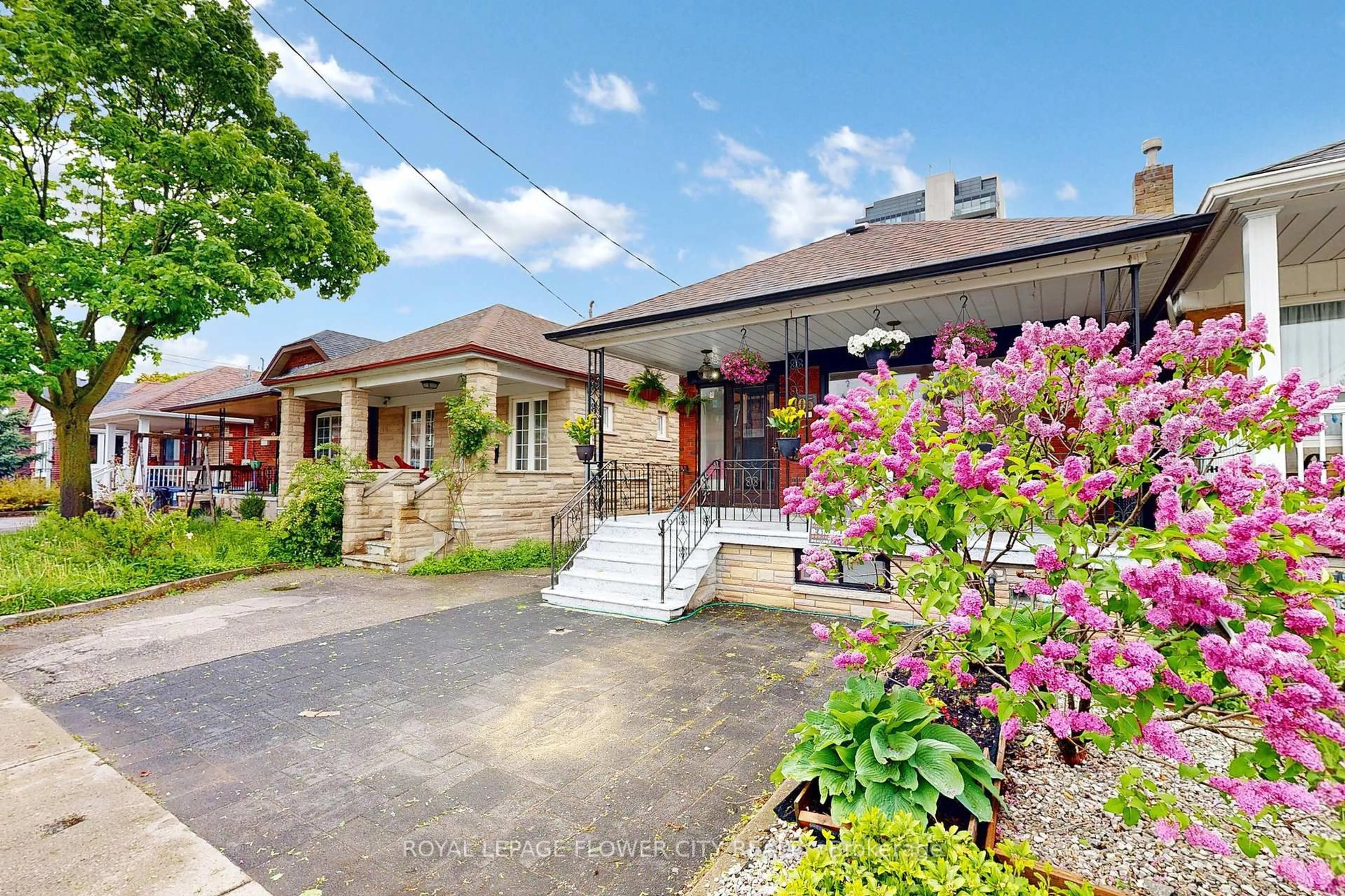 Home with brick exterior material, street for 105 Livingstone Ave, Toronto Ontario M6E 2L7