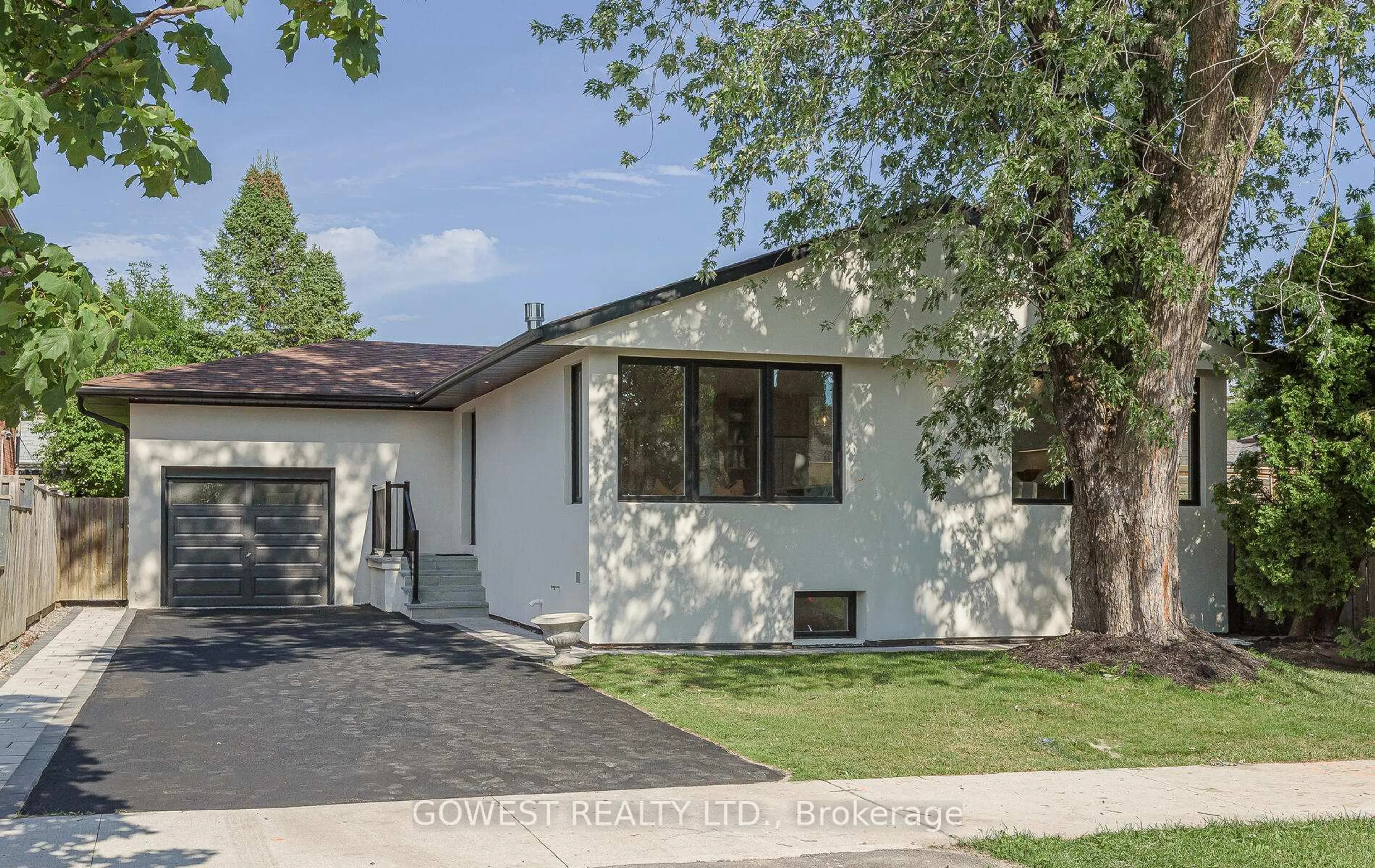 Home with vinyl exterior material, street for 28 Allonsius Dr, Toronto Ontario M9C 3N5