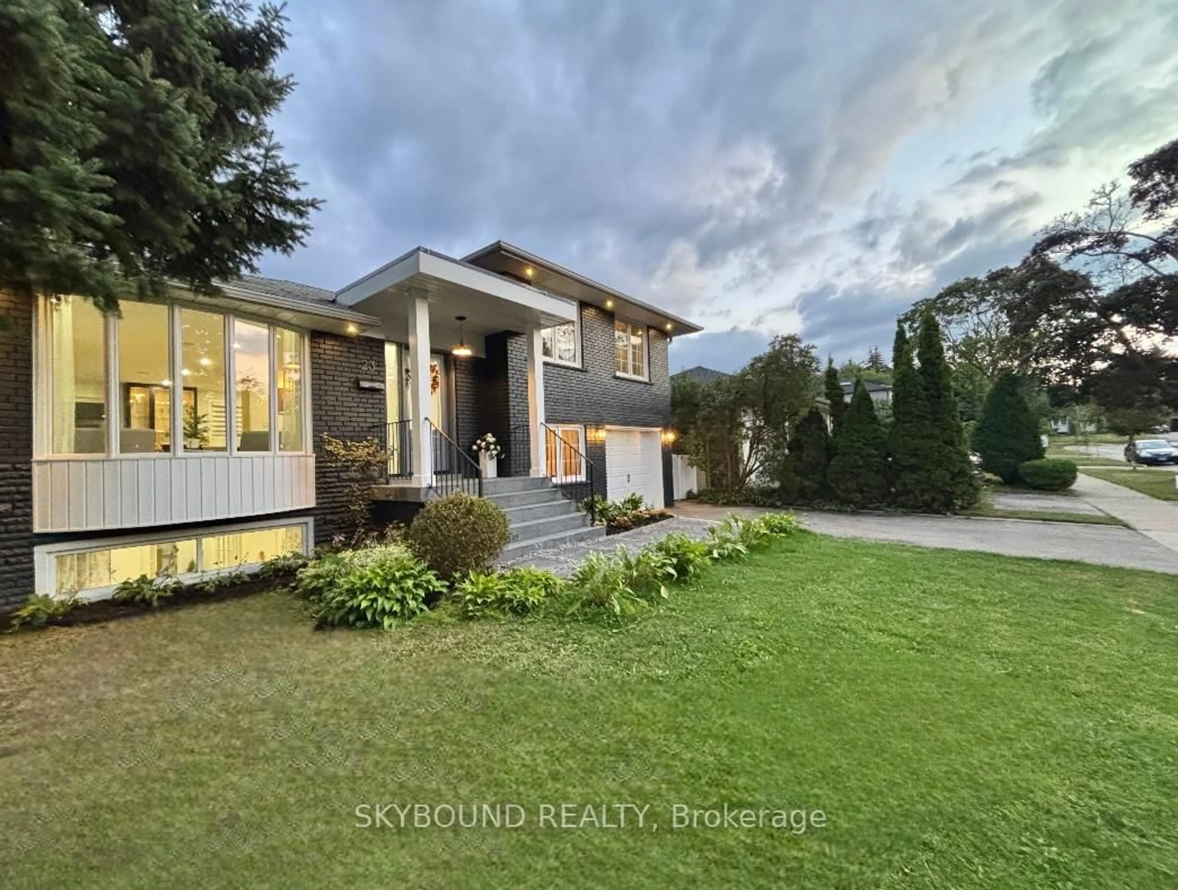 Home with brick exterior material, mountain view for 23 Drury Lane, Toronto Ontario M9P 1P8