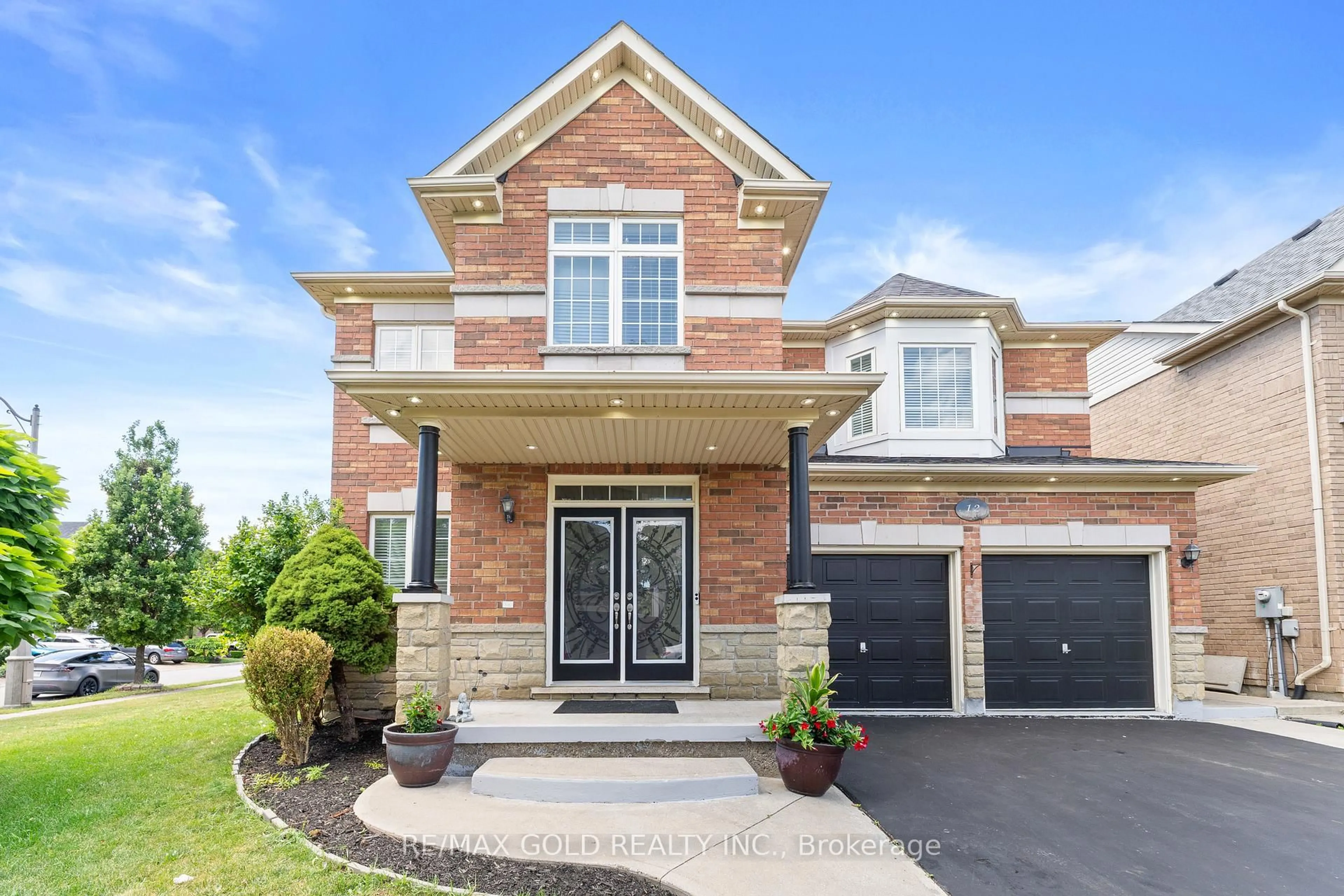 Home with brick exterior material, street for 12 Smoothrock Tr, Brampton Ontario L6R 0S5