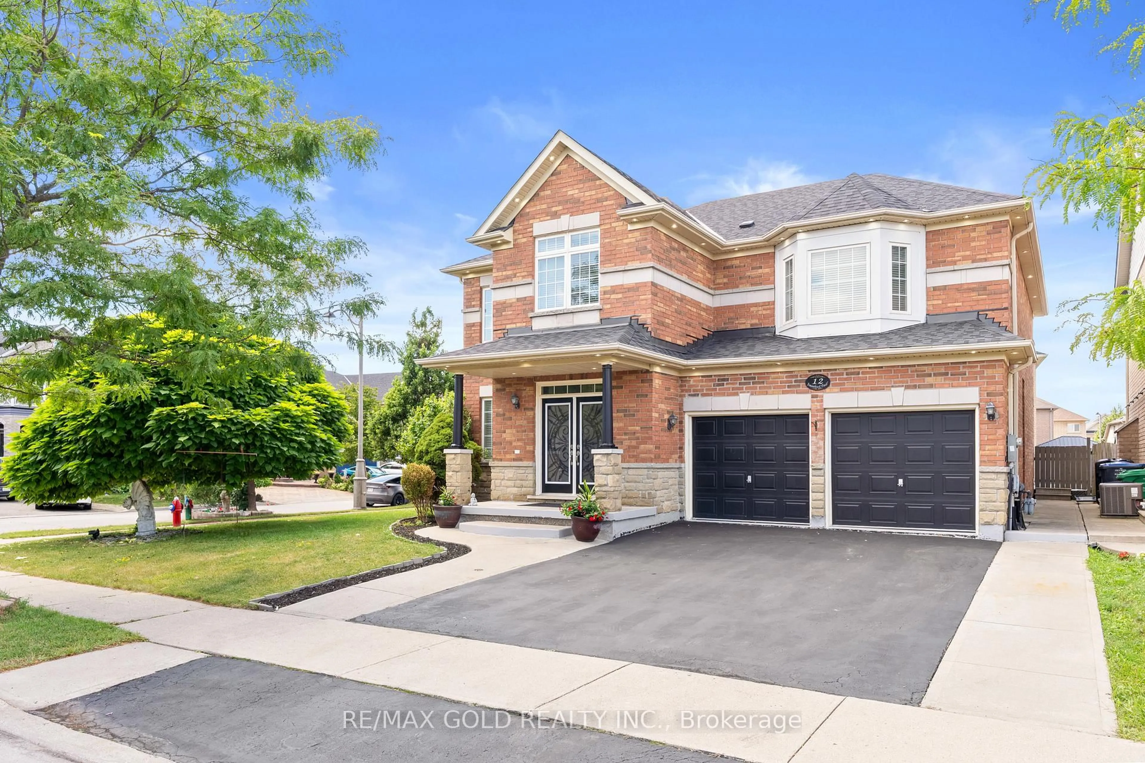 Home with brick exterior material, street for 12 Smoothrock Tr, Brampton Ontario L6R 0S5
