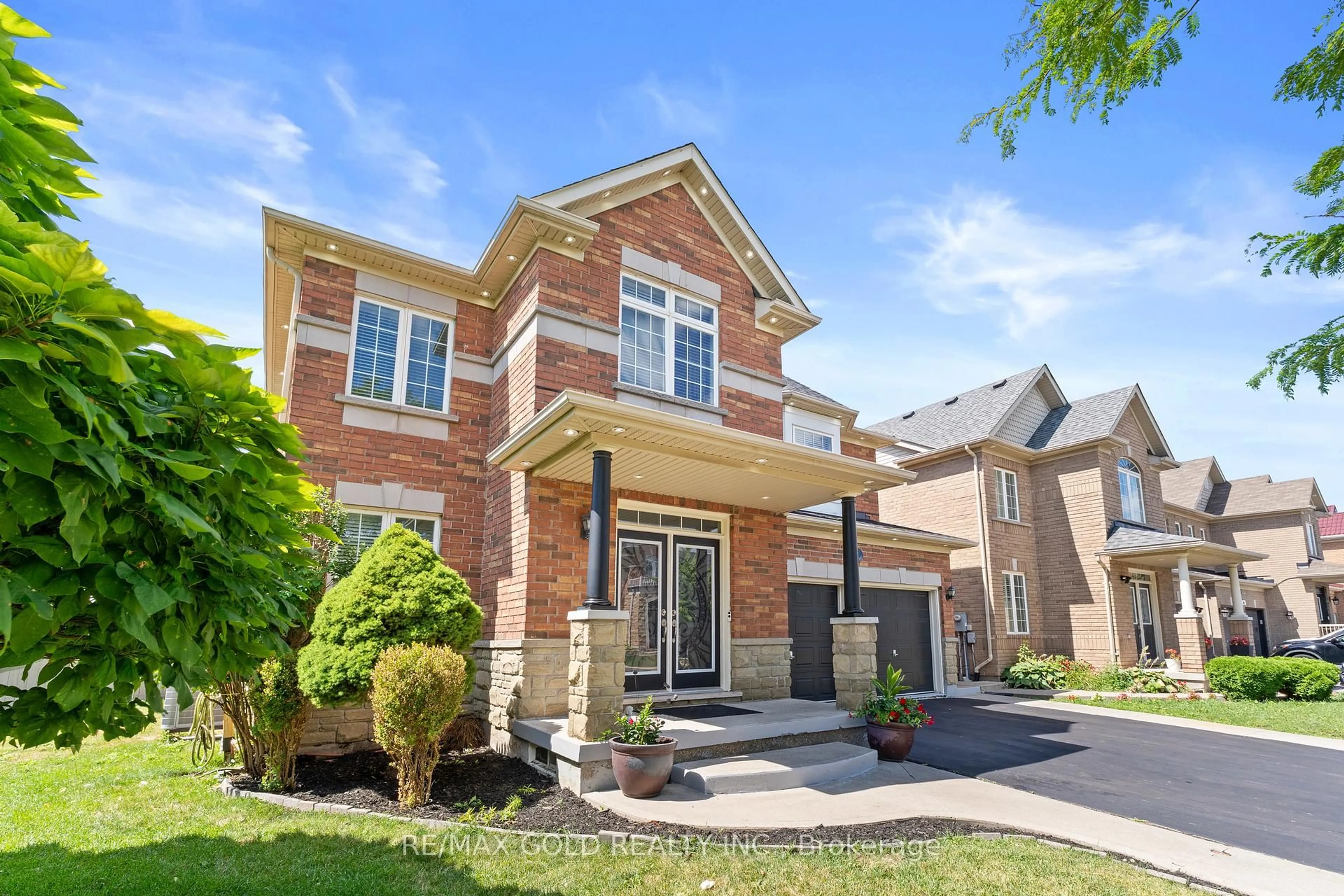 Home with brick exterior material, street for 12 Smoothrock Tr, Brampton Ontario L6R 0S5