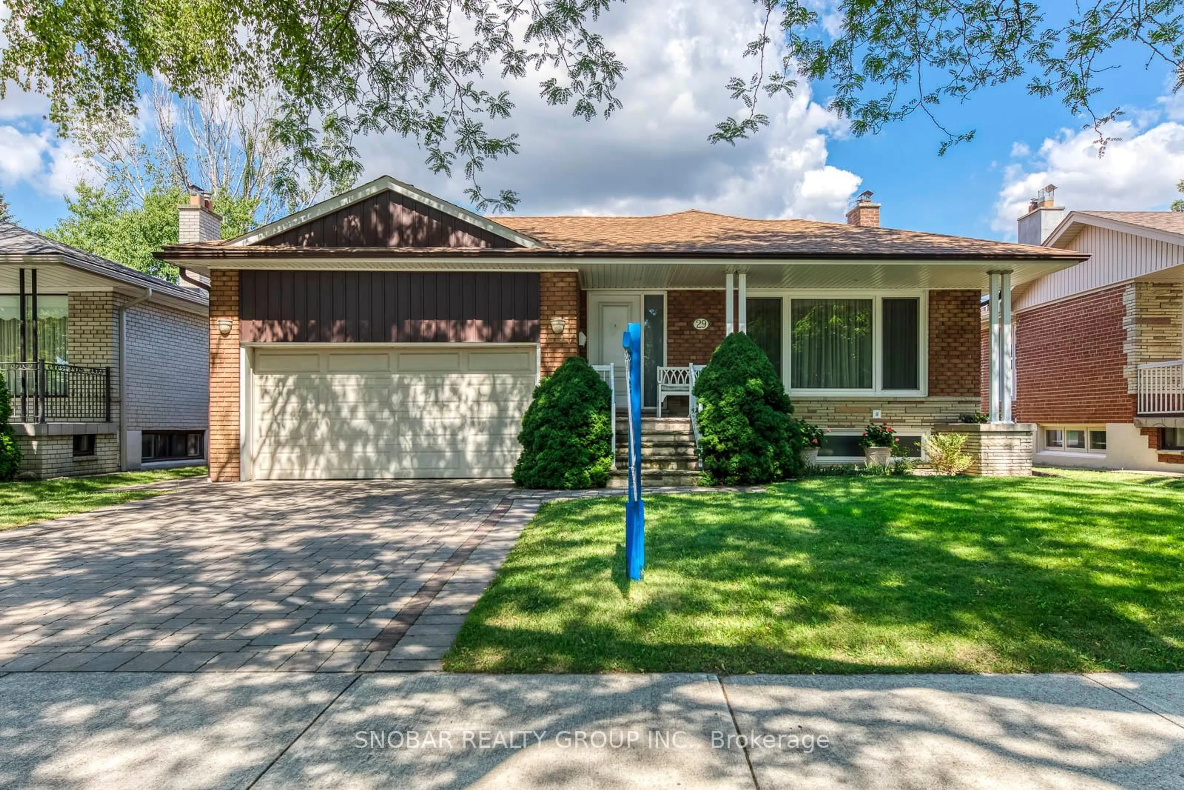Home with brick exterior material, street for 29 Woodpark Rd, Toronto Ontario M9P 1L9