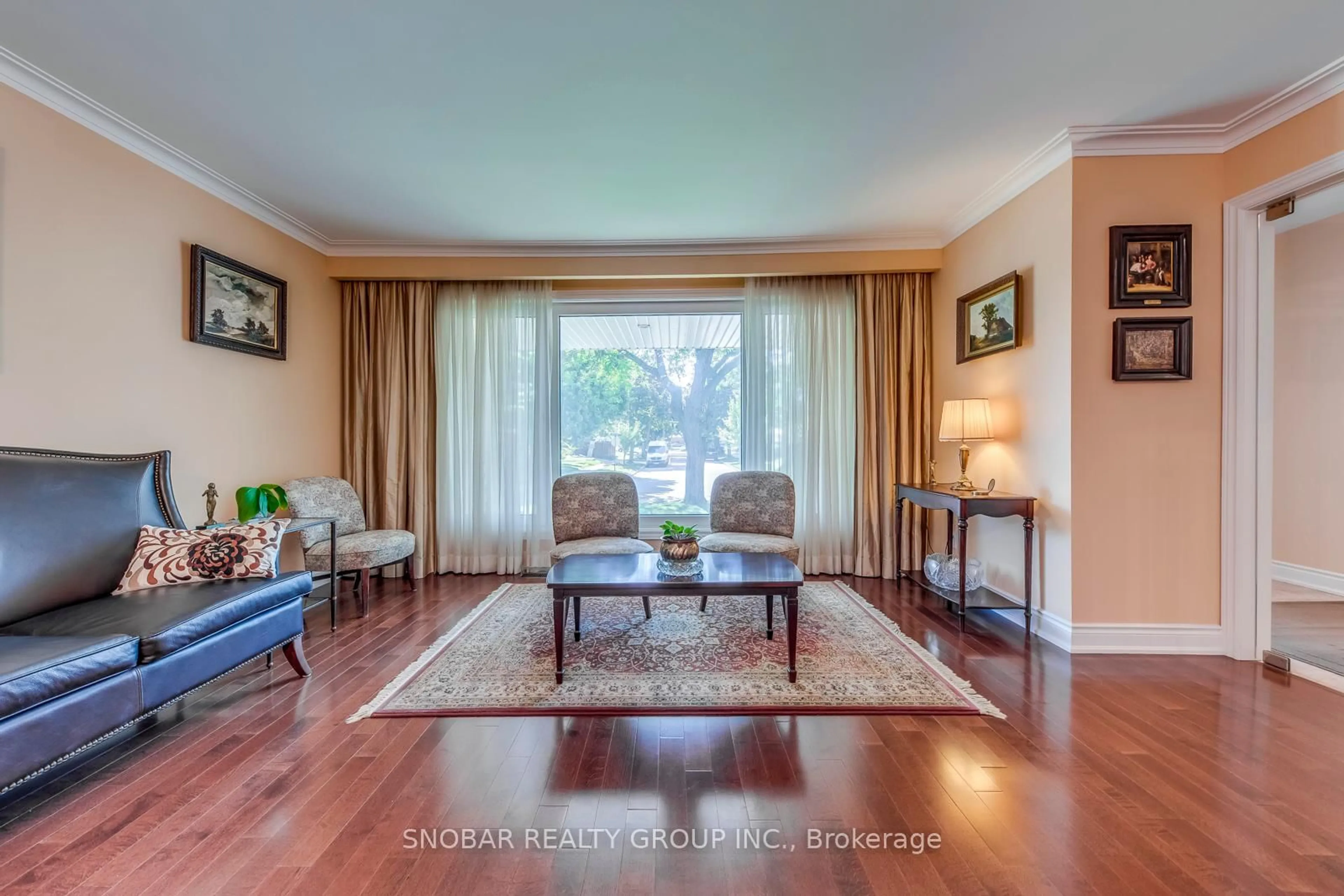 Living room with furniture, wood/laminate floor for 29 Woodpark Rd, Toronto Ontario M9P 1L9