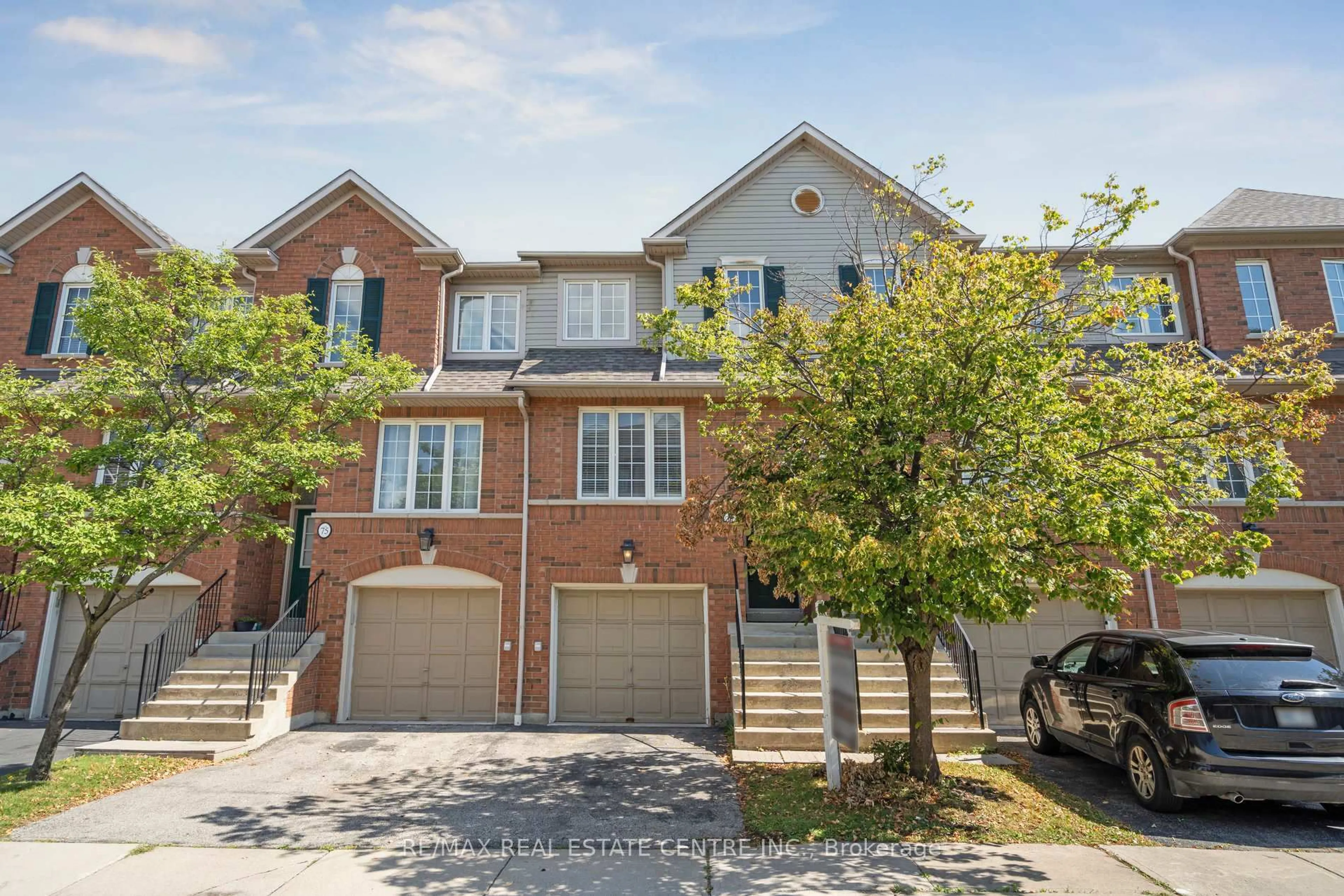 Home with brick exterior material, street for 4950 Albina Way #77, Mississauga Ontario L4Z 4J5