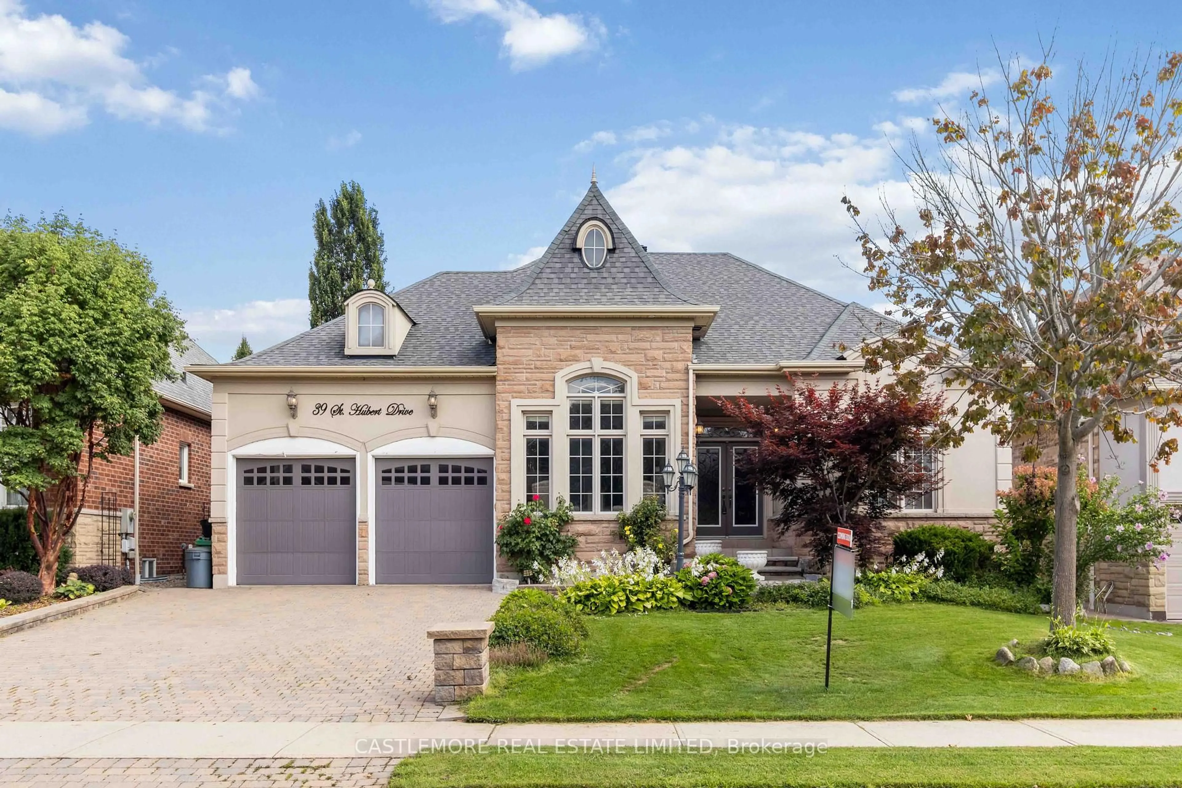 Home with brick exterior material, street for 39 Saint Hubert Dr, Brampton Ontario L6P 1W1