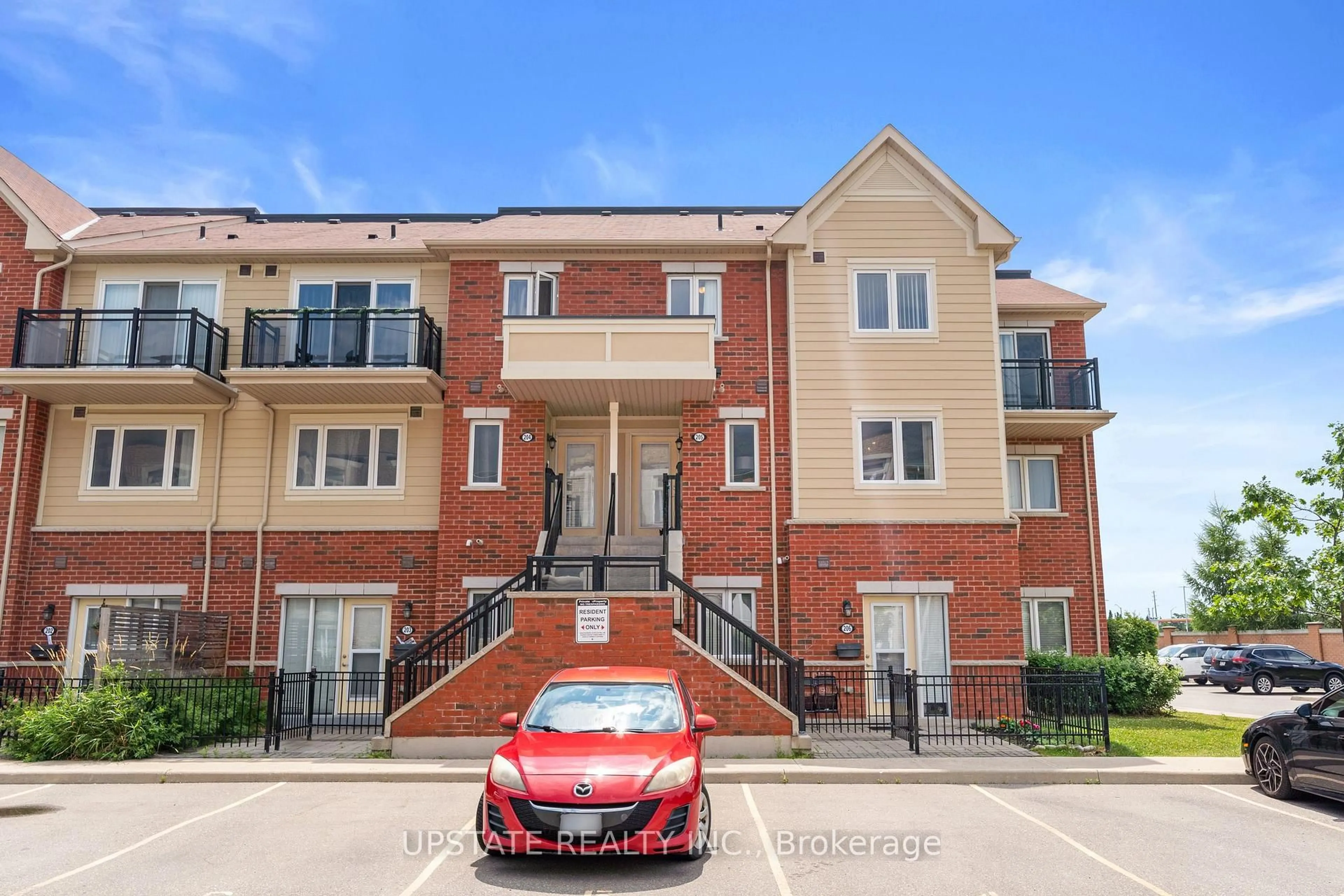 A pic from outside/outdoor area/front of a property/back of a property/a pic from drone, street for 250 Sunny Meadow Blvd #205, Brampton Ontario L6R 2Y7
