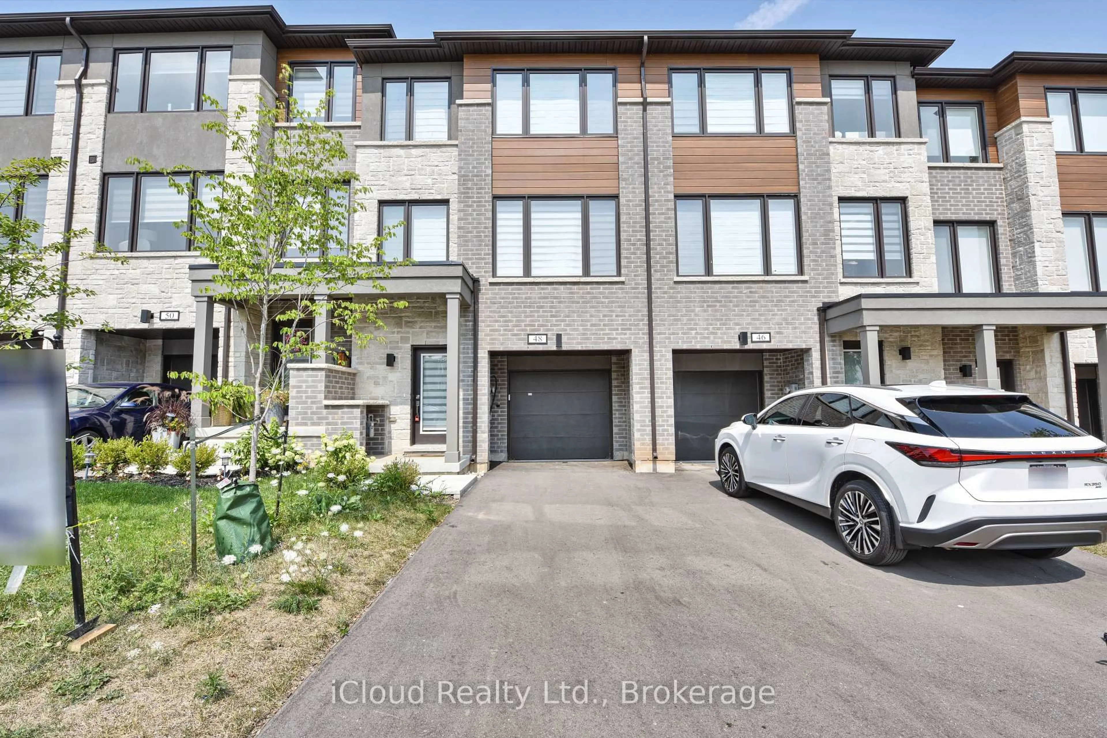 A pic from outside/outdoor area/front of a property/back of a property/a pic from drone, street for 48 Windtree Way, Halton Hills Ontario L7G 0P6