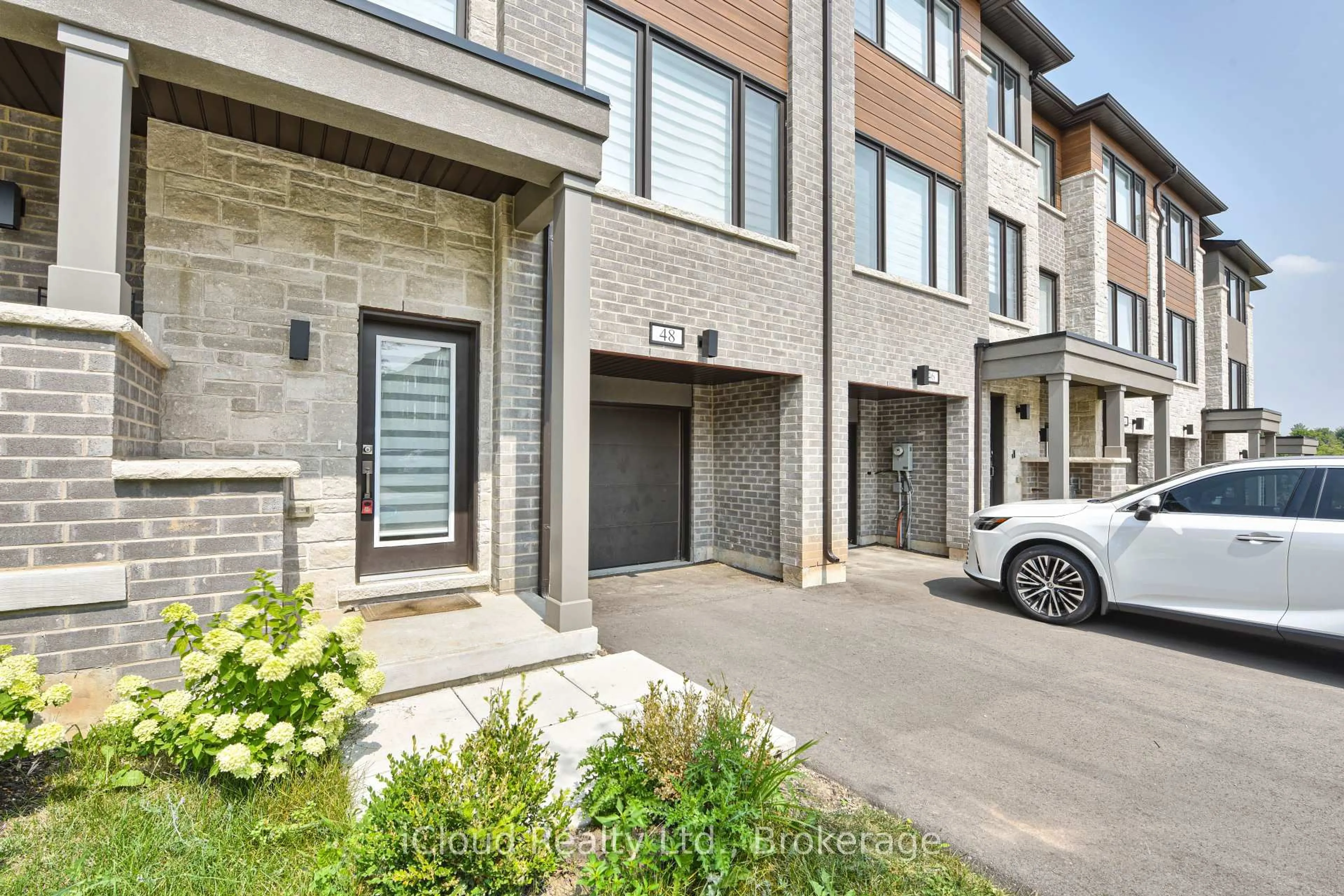 Home with brick exterior material, street for 48 Windtree Way, Halton Hills Ontario L7G 0P6