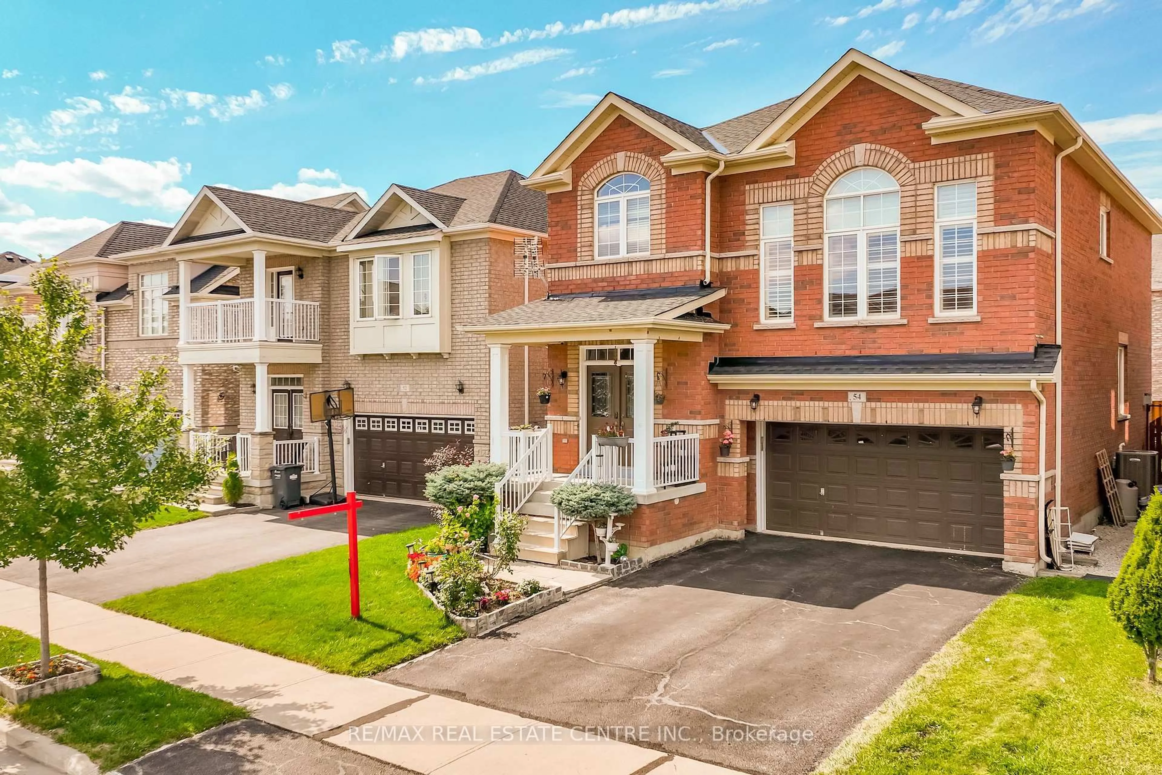 Home with brick exterior material, street for 54 Iceland Poppy Tr, Brampton Ontario L7A 0M9
