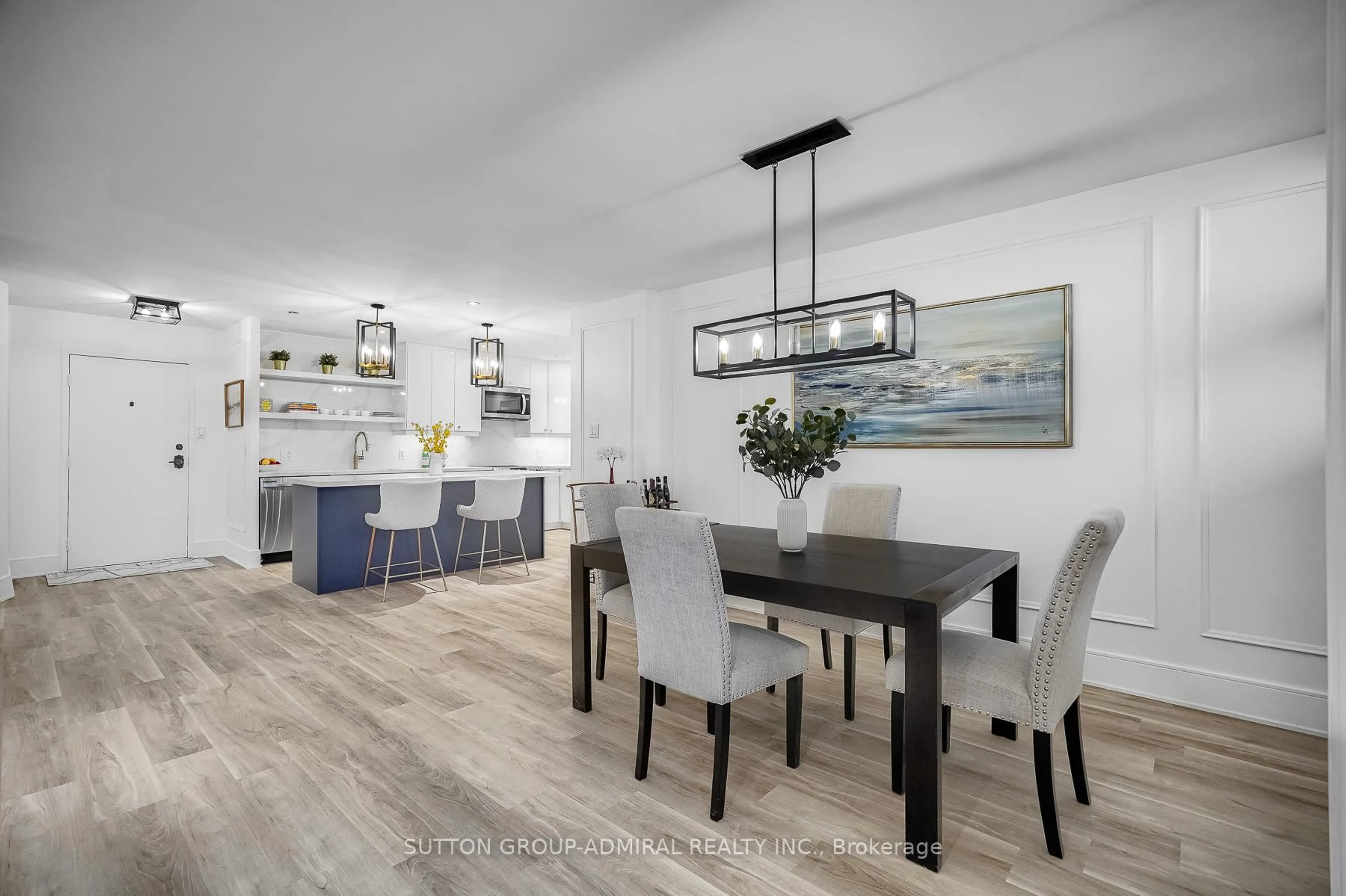 Open concept kitchen, wood/laminate floor for 299 Mill Rd #PH3, Toronto Ontario M9C 4V9