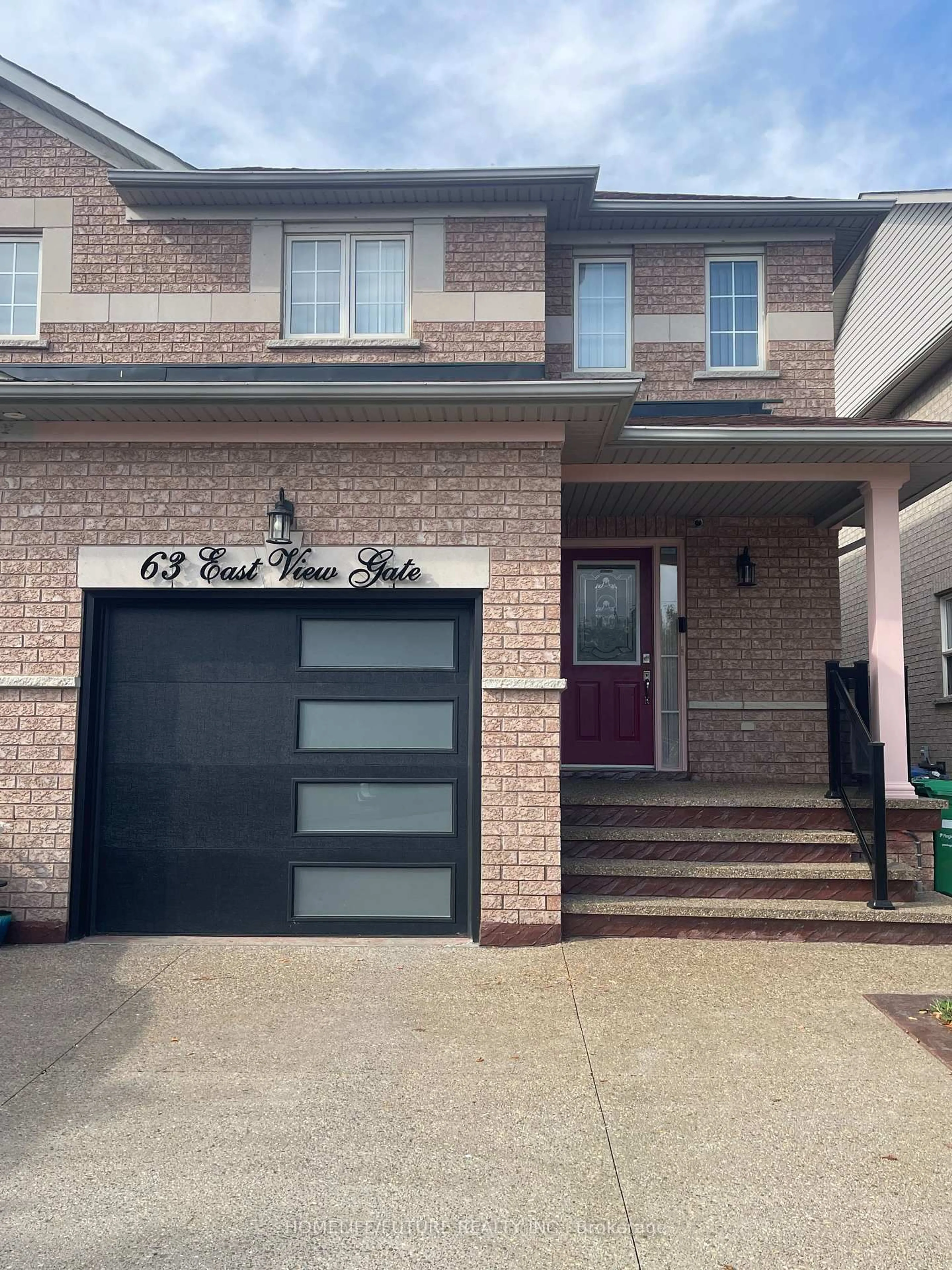 Home with brick exterior material, street for 63 Eastview Gate, Brampton Ontario L6P 1N5