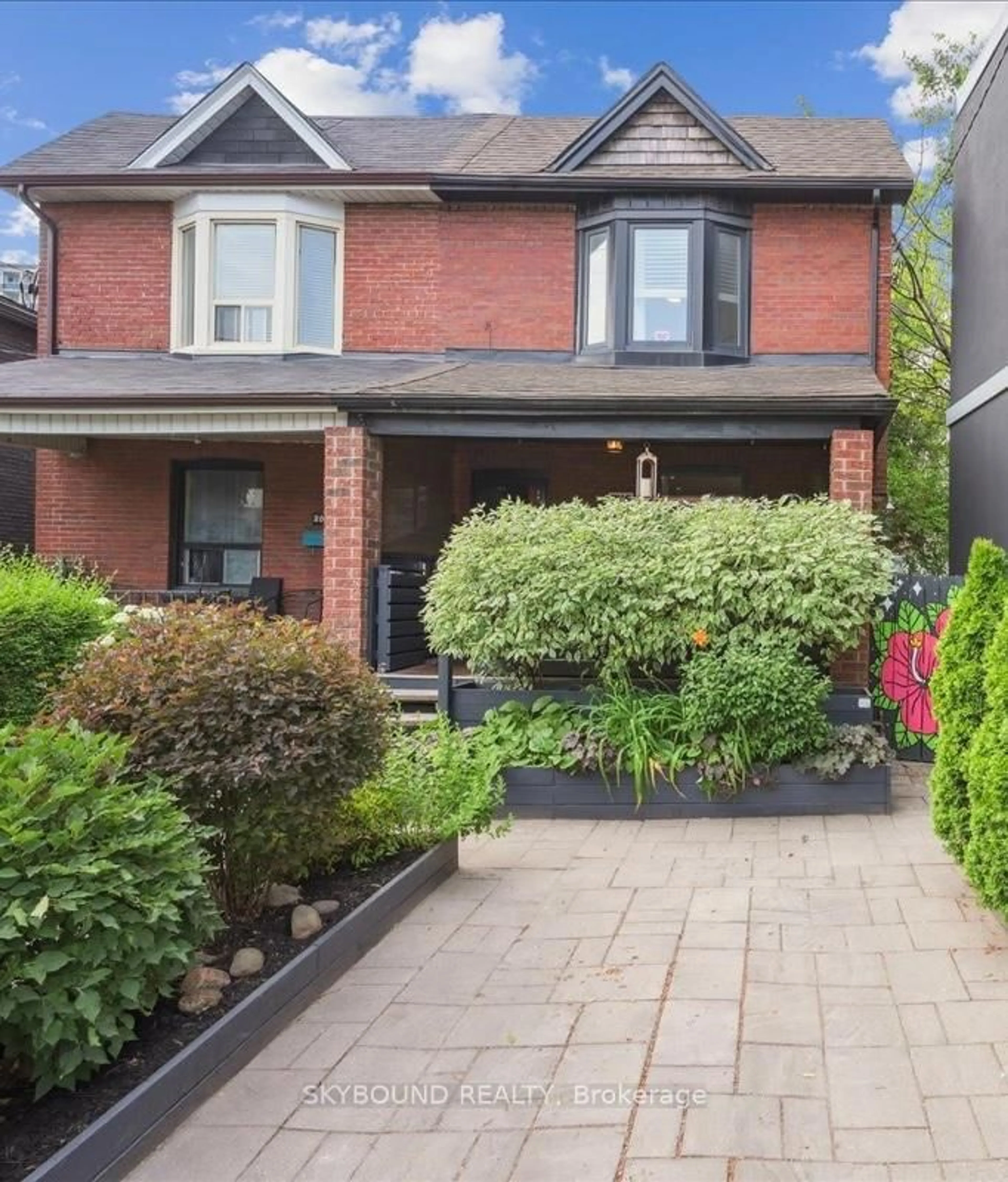 Home with brick exterior material, street for 2043 Davenport Rd, Toronto Ontario M6N 1C5