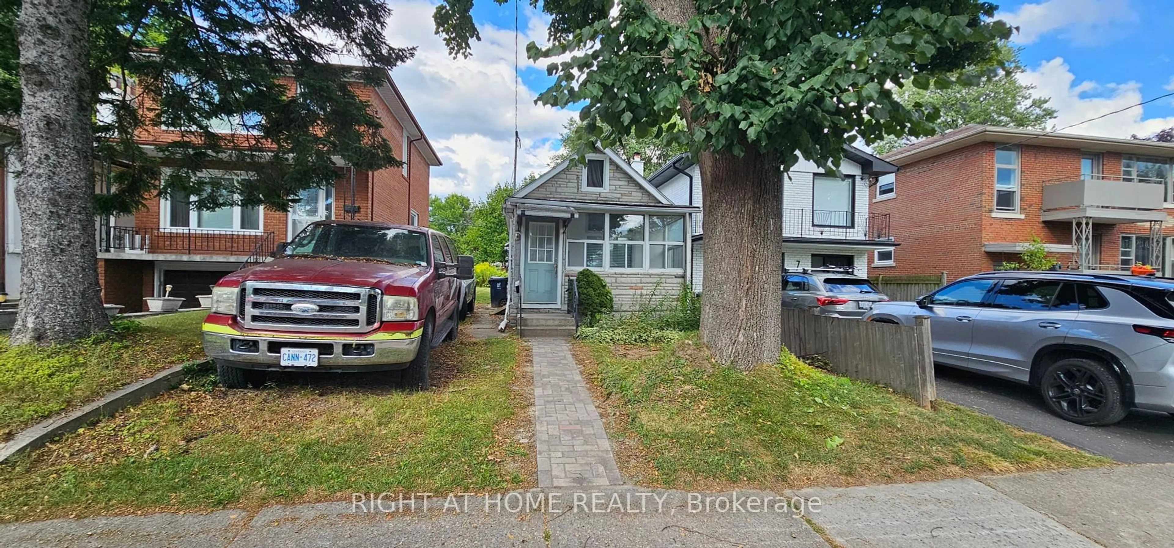 A pic from outside/outdoor area/front of a property/back of a property/a pic from drone, street for 9 Forty First St, Toronto Ontario M8W 3N4