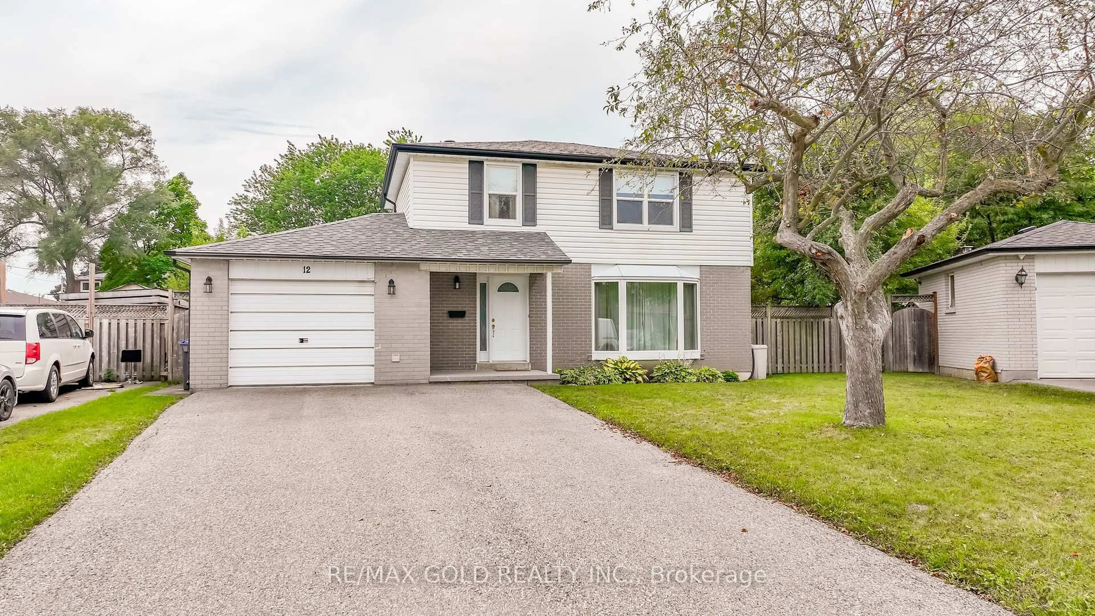 Home with vinyl exterior material, street for 12 Dunblaine Cres, Brampton Ontario L6T 3H2