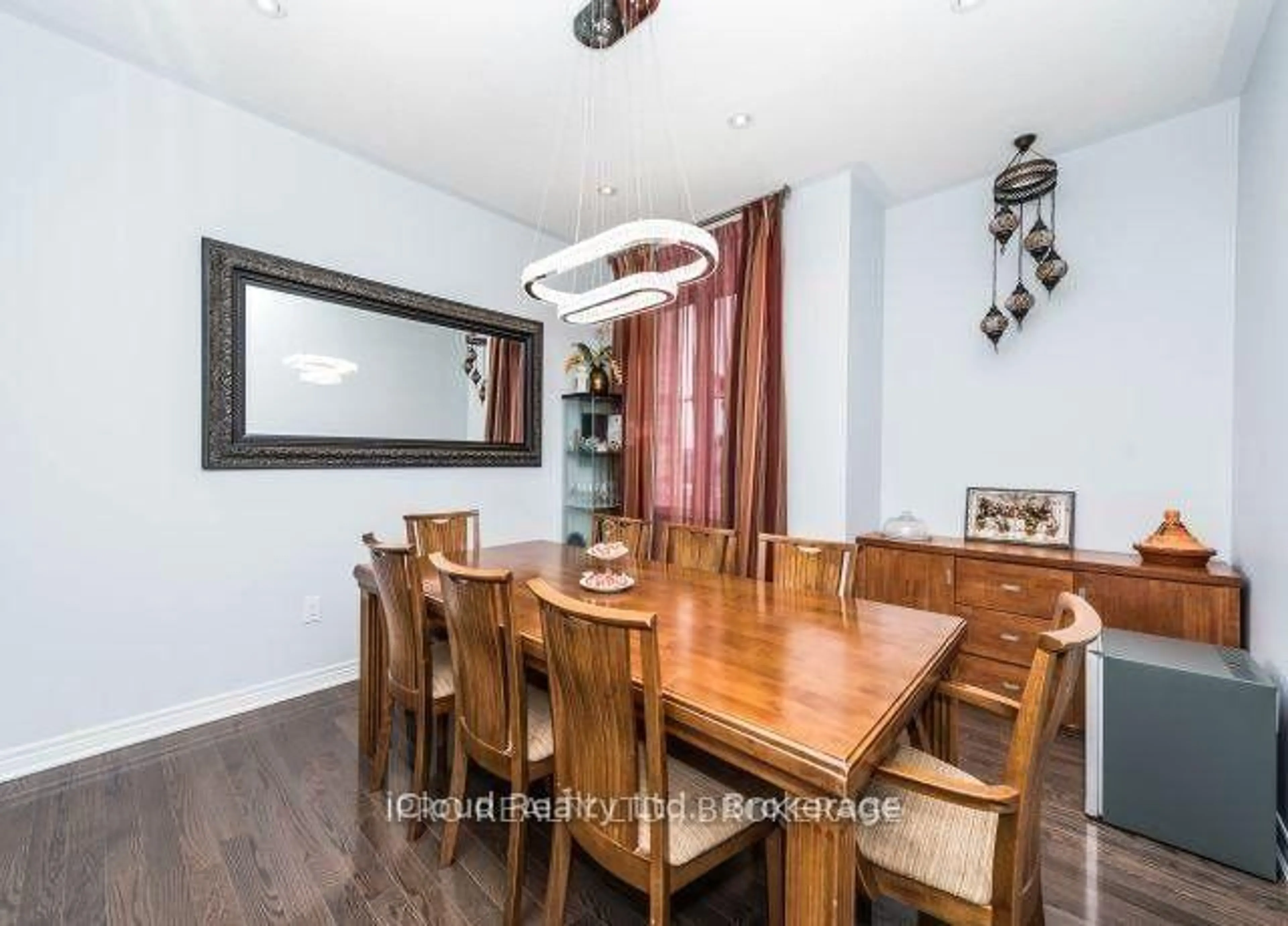 Dining room, wood/laminate floor for 27 Tysonville Circ, Brampton Ontario L7A 4A6