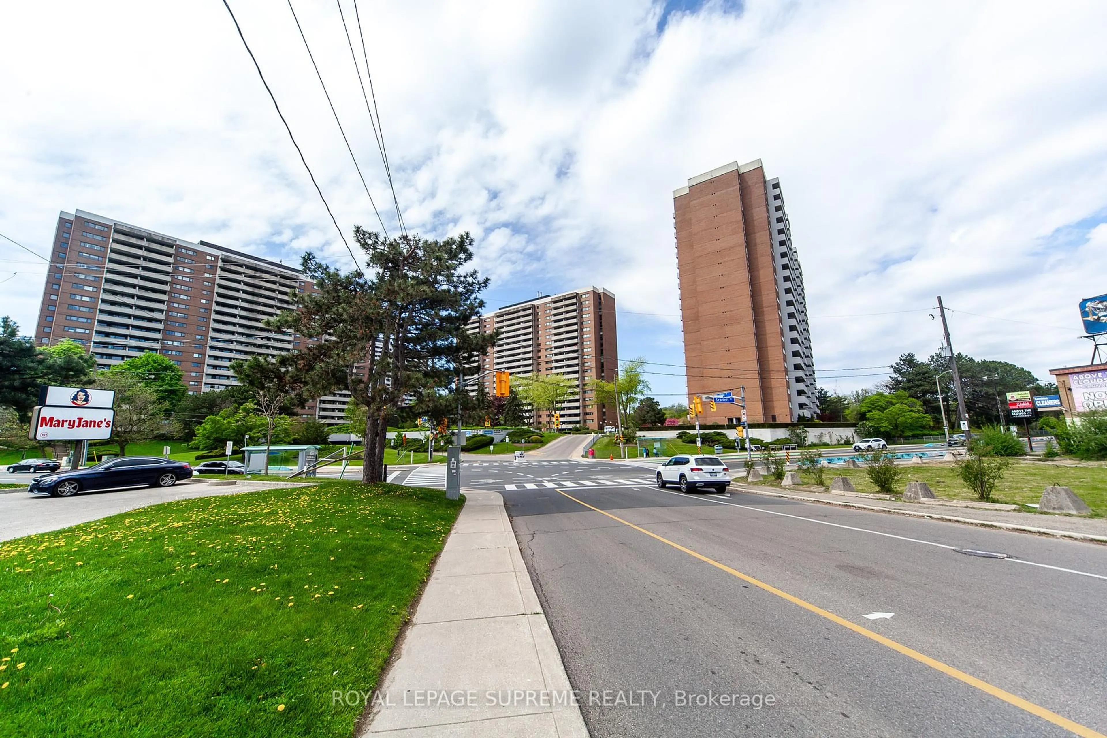 A pic from outside/outdoor area/front of a property/back of a property/a pic from drone, street for 270 Scarlett Rd #205, Toronto Ontario M6N 4X7