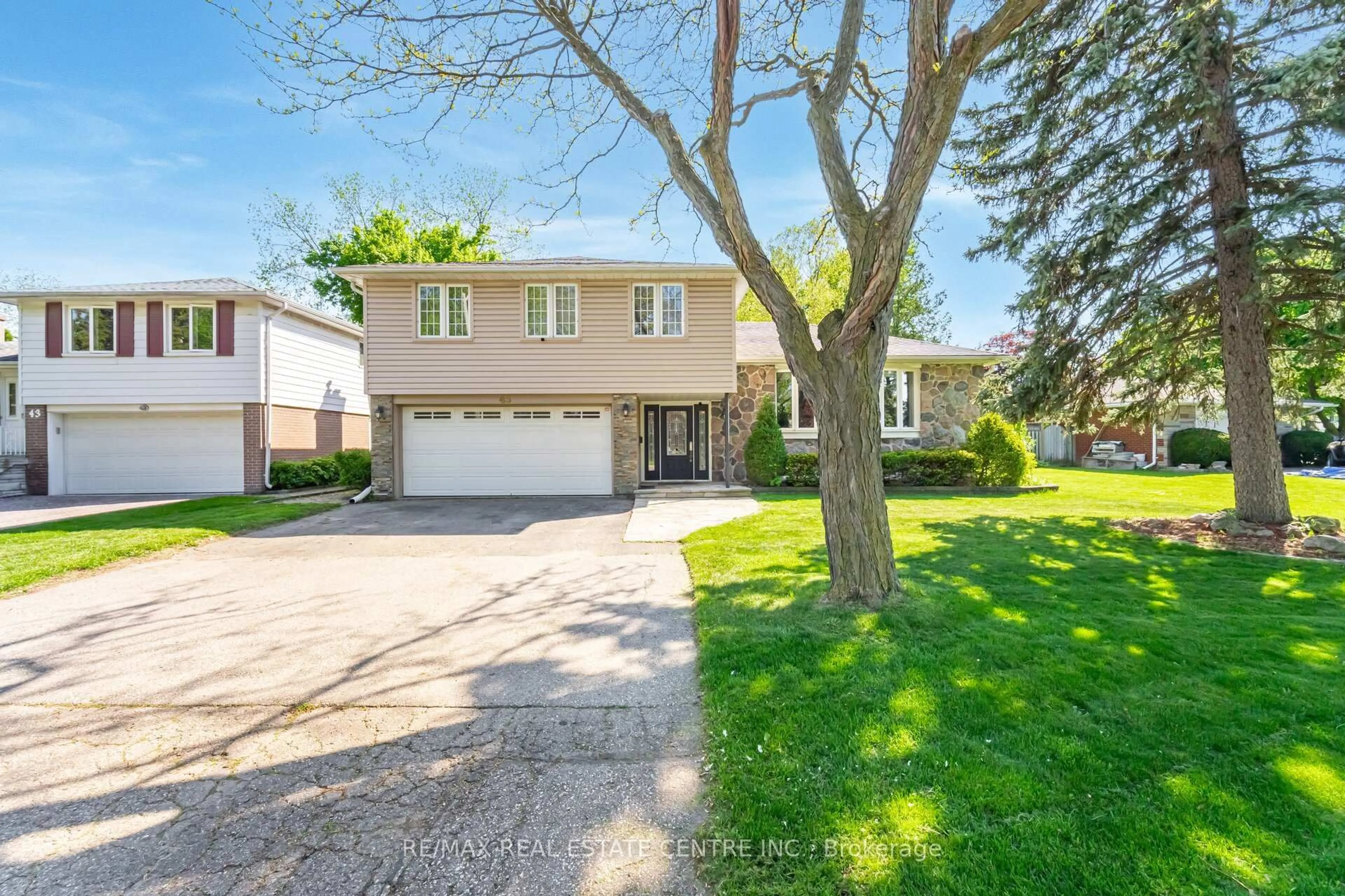 Home with brick exterior material, street for 45 Core Cres, Brampton Ontario L6W 2G6