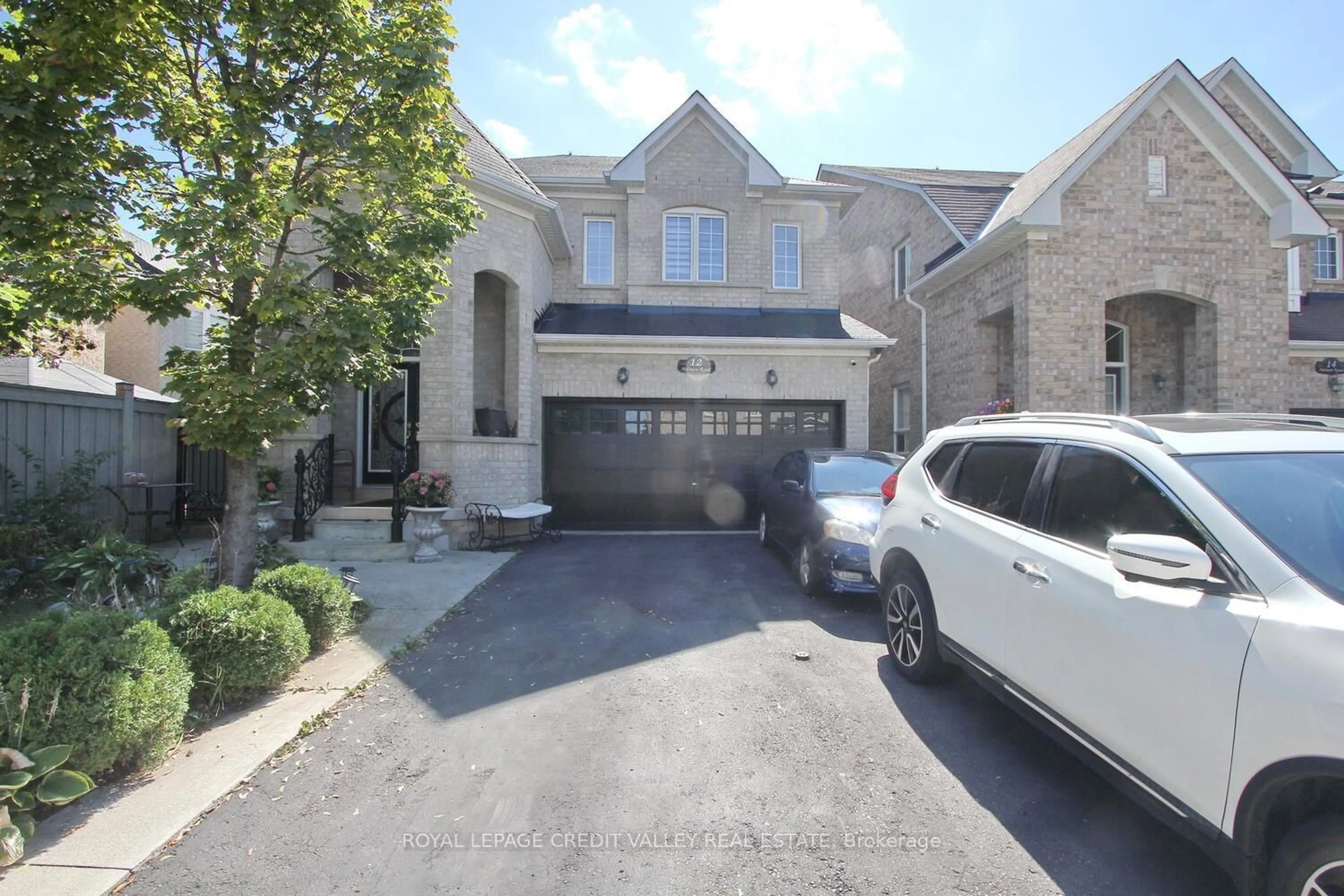 A pic from outside/outdoor area/front of a property/back of a property/a pic from drone, street for 12 Helman Rd, Brampton Ontario L6R 0R6