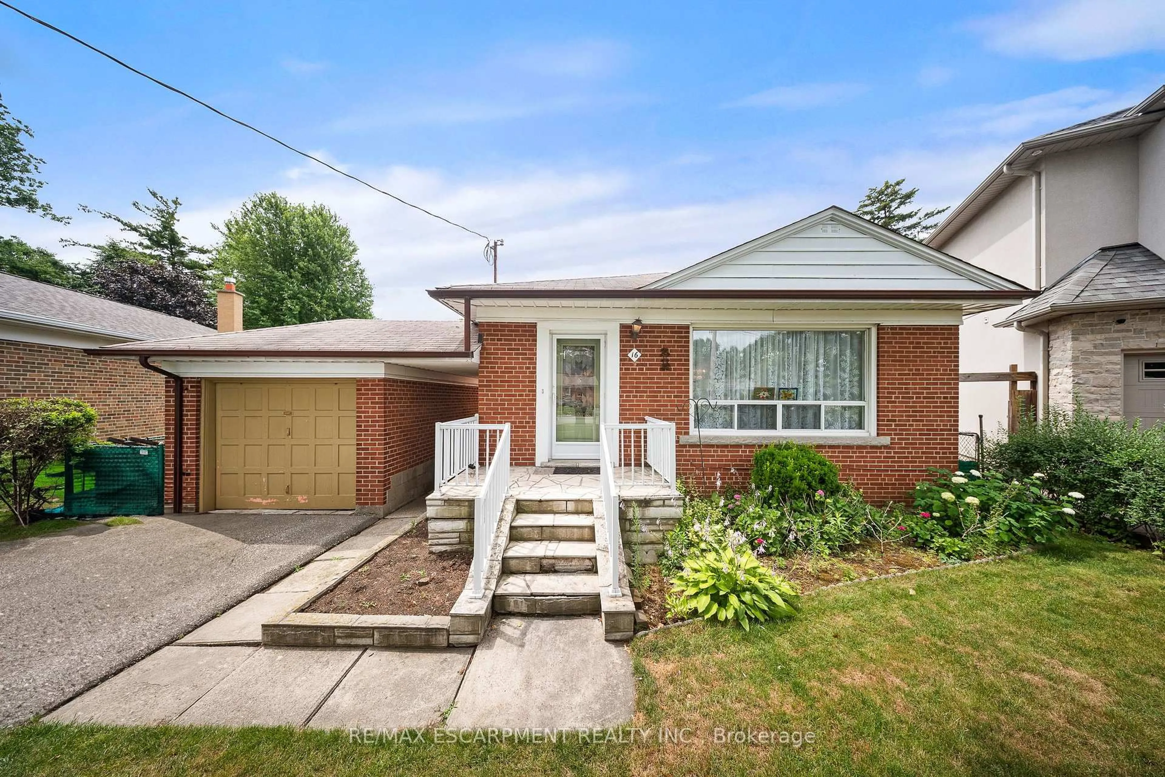 Home with brick exterior material, street for 16 Northampton Dr, Toronto Ontario M9B 4S6