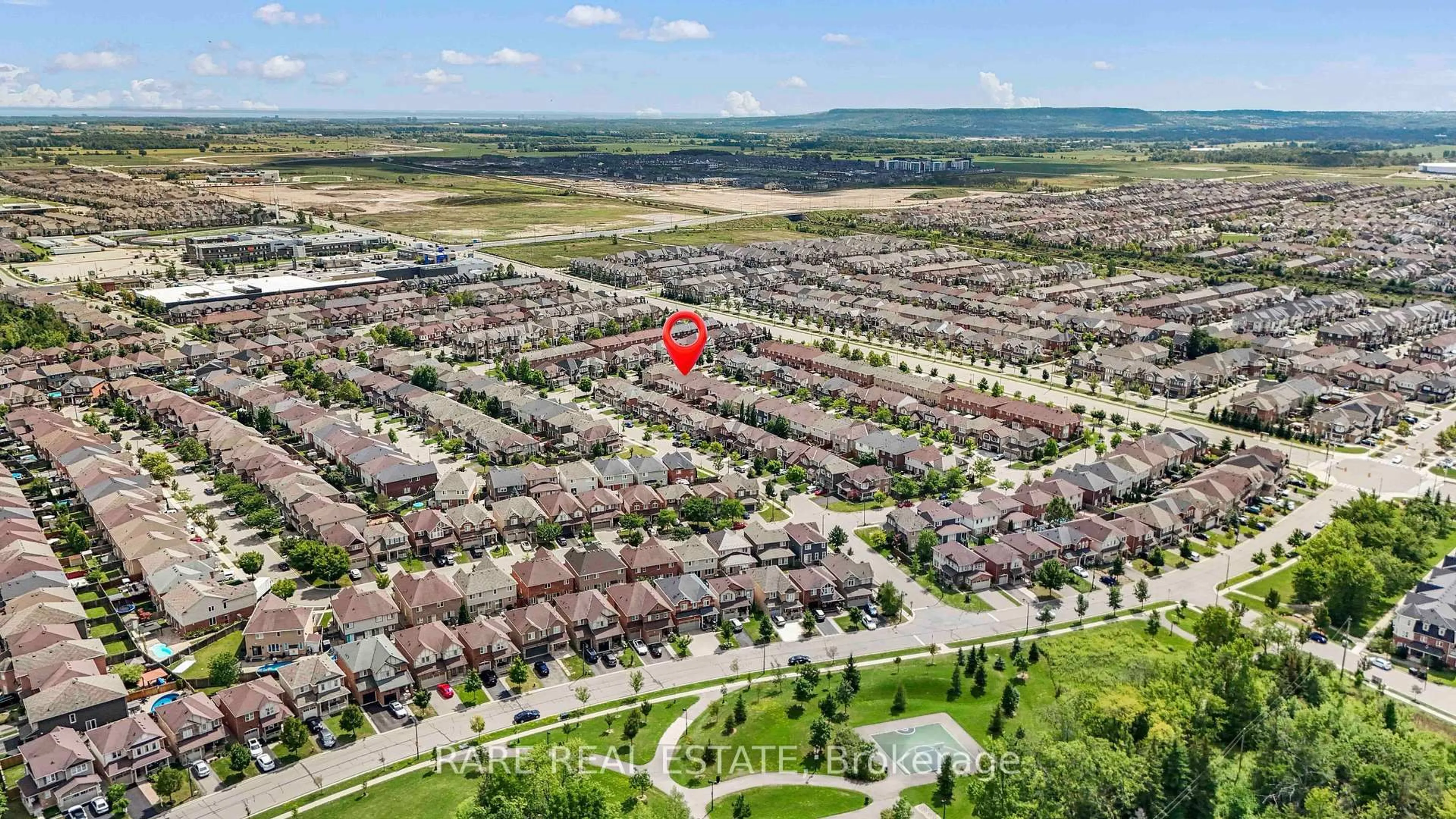 A pic from outside/outdoor area/front of a property/back of a property/a pic from drone, street for 953 Rigo Cross, Milton Ontario L9T 8C5