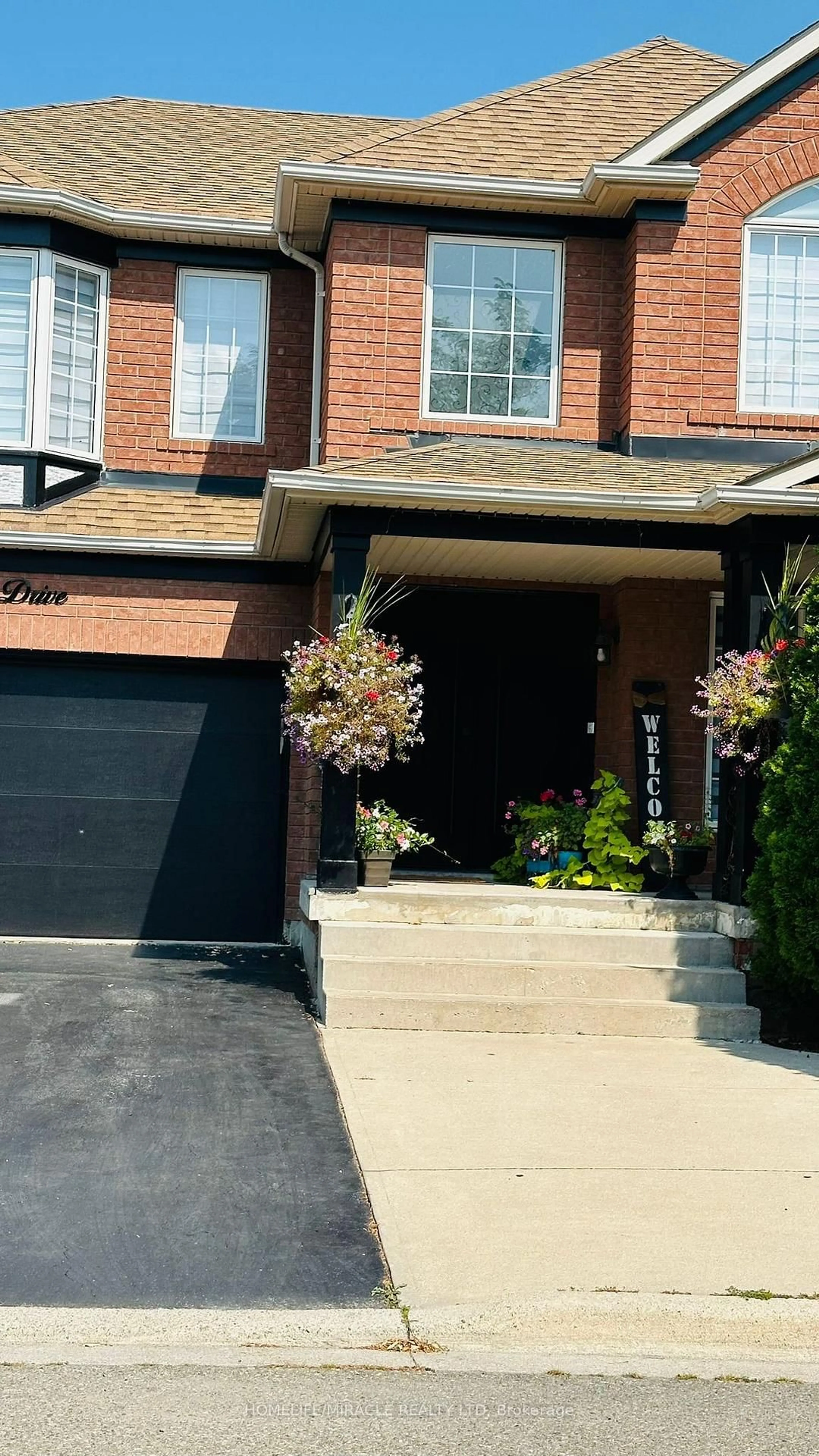 Home with brick exterior material, street for 28 Bowsfield Dr, Brampton Ontario L6P 1A6
