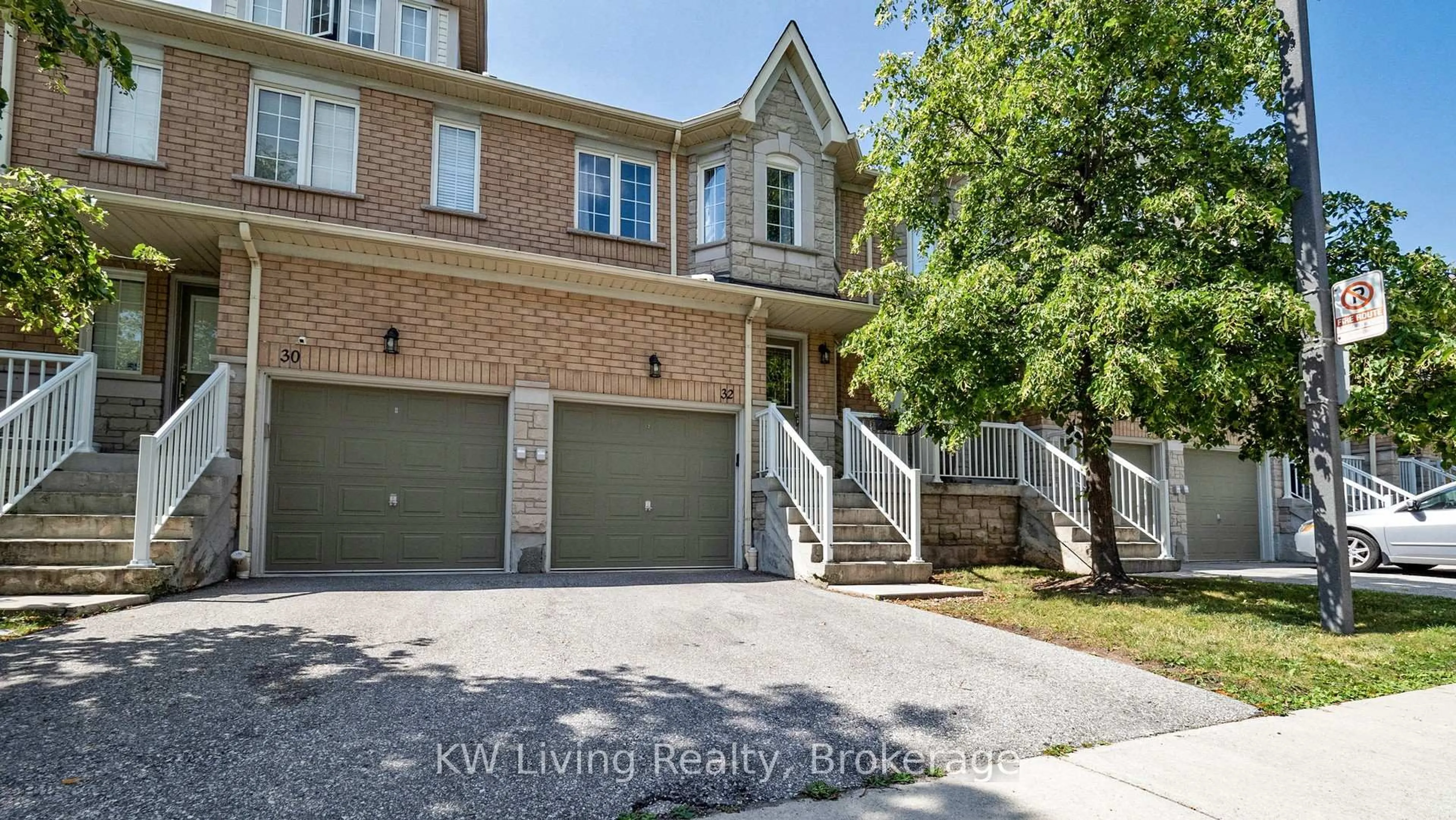 Home with brick exterior material, street for 5260 McFarren Blvd #32, Mississauga Ontario L5M 7J1