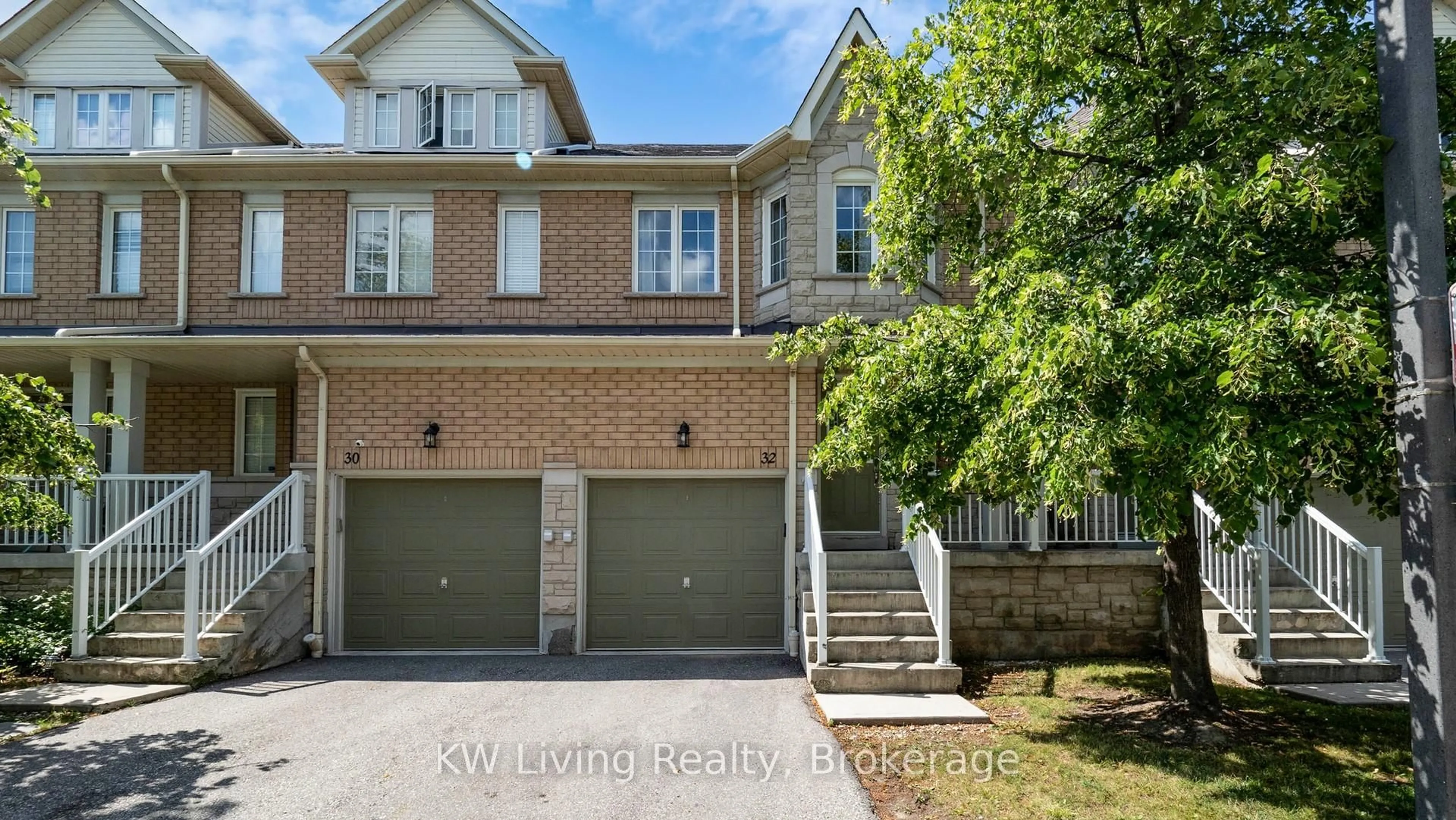 Home with brick exterior material, street for 5260 McFarren Blvd #32, Mississauga Ontario L5M 7J1