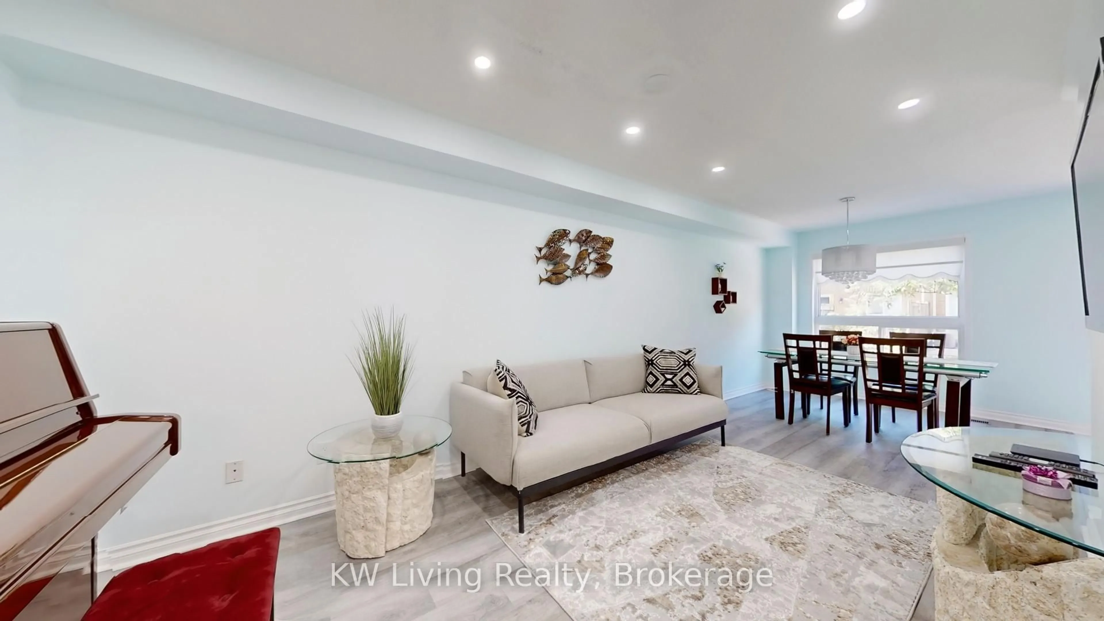 Living room with furniture, ceramic/tile floor for 5260 McFarren Blvd #32, Mississauga Ontario L5M 7J1