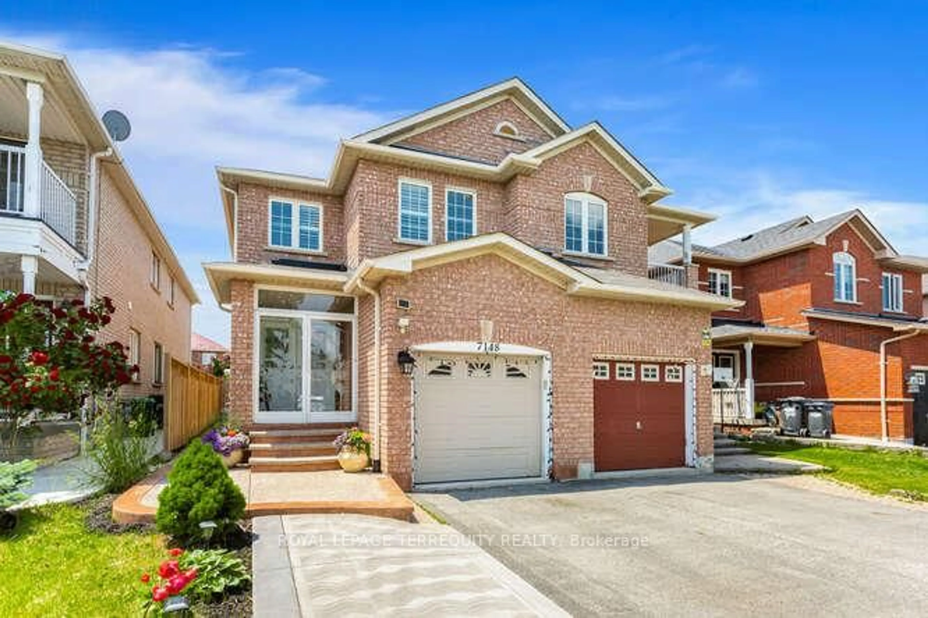 Home with brick exterior material, street for 7148 Village Walk, Mississauga Ontario L5W 1X2
