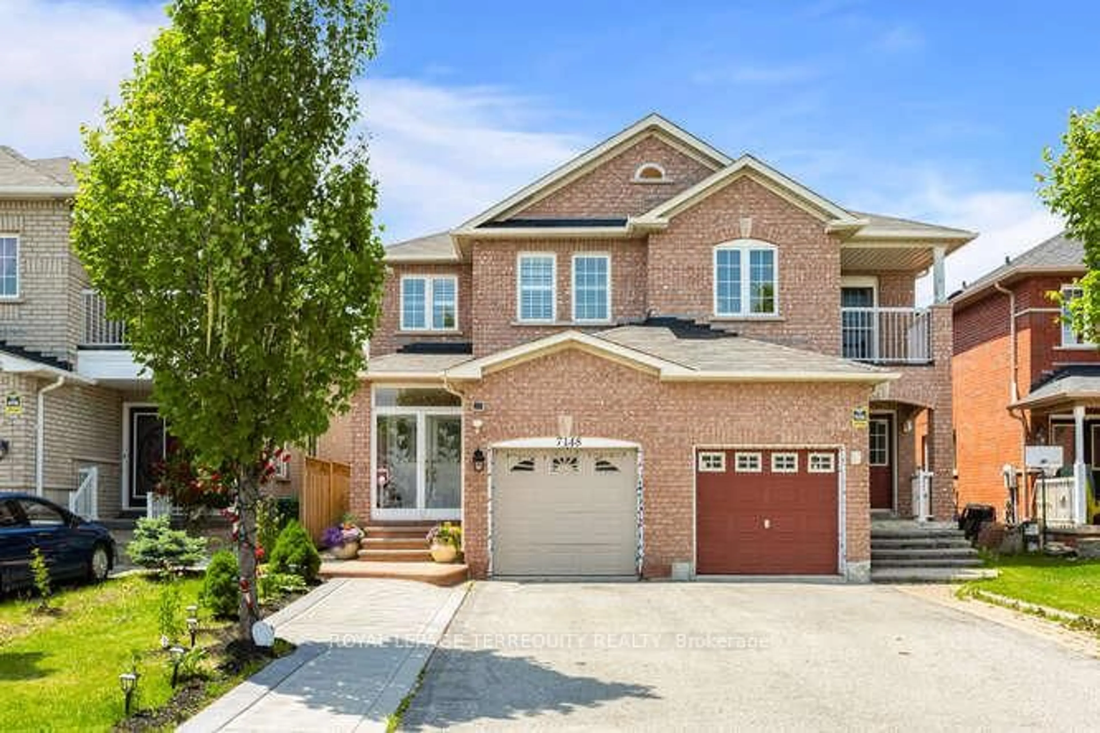 Home with brick exterior material, street for 7148 Village Walk, Mississauga Ontario L5W 1X2