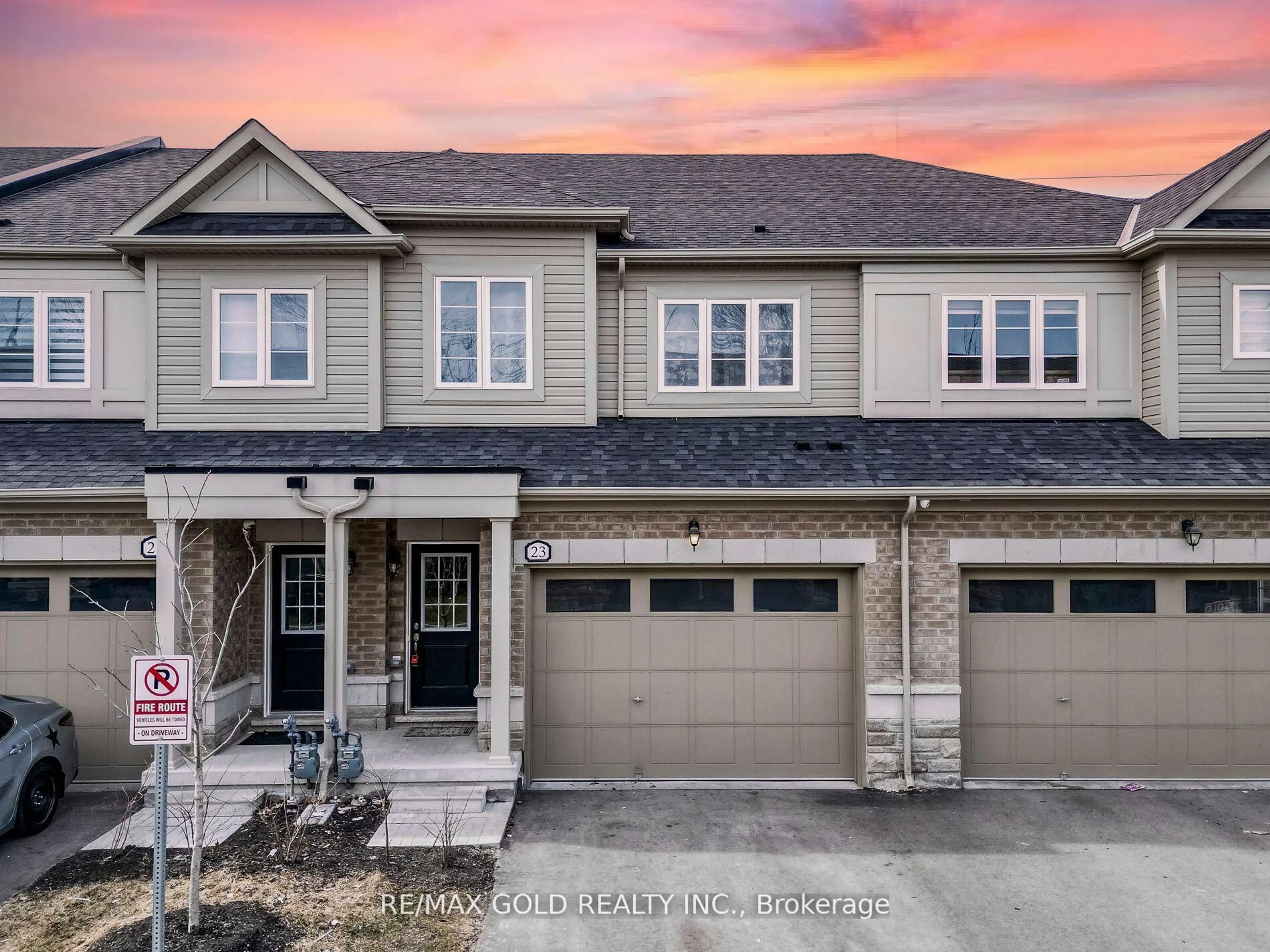 Home with brick exterior material, street for 23 Brixham Lane, Brampton Ontario L7A 5K2